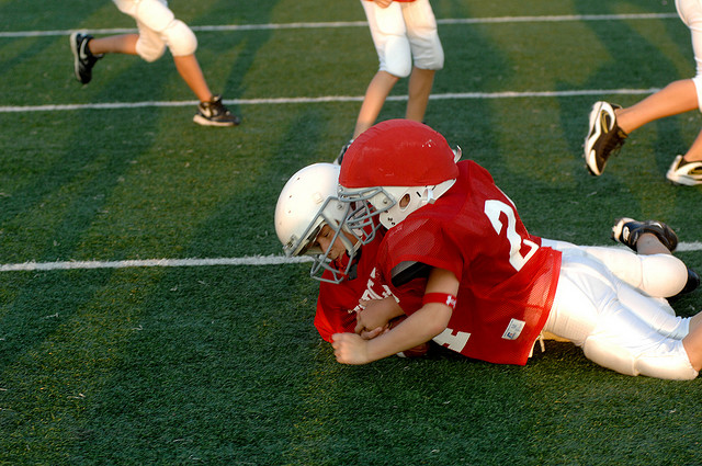 football youth tackle, Jeff Montgomery (CC-BY-NC-ND)