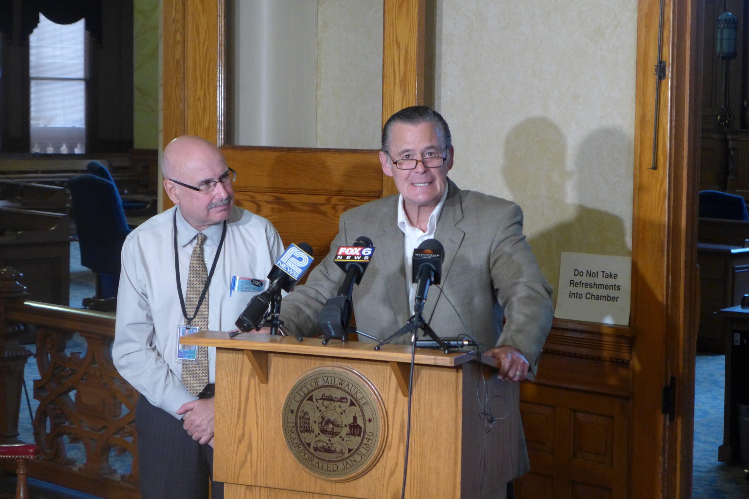 Alderman Bob Donovan and Mark Borkowski announce the common council's online survey for public safety.