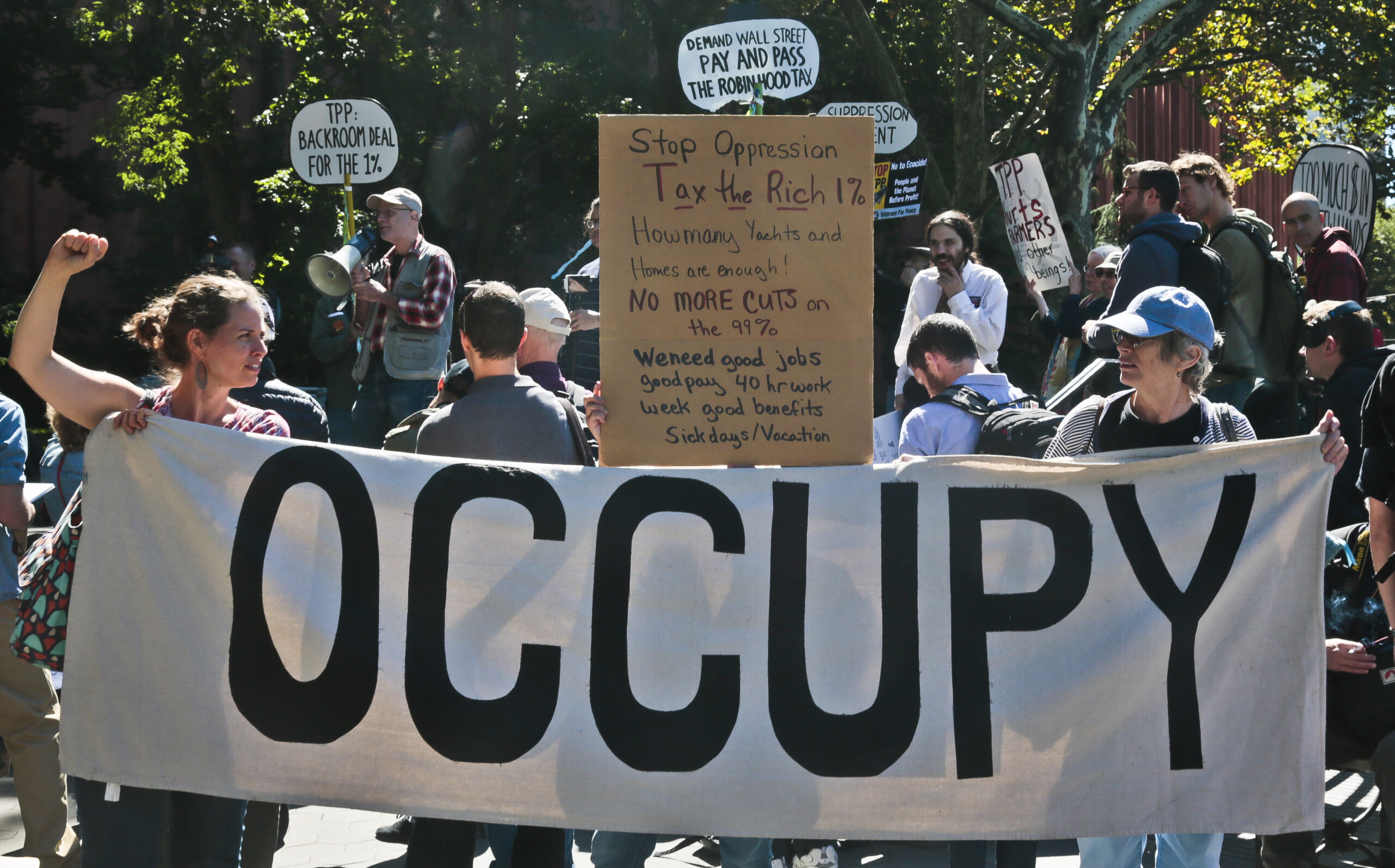 Protesters representing the Occupy Wall Street movement, rally