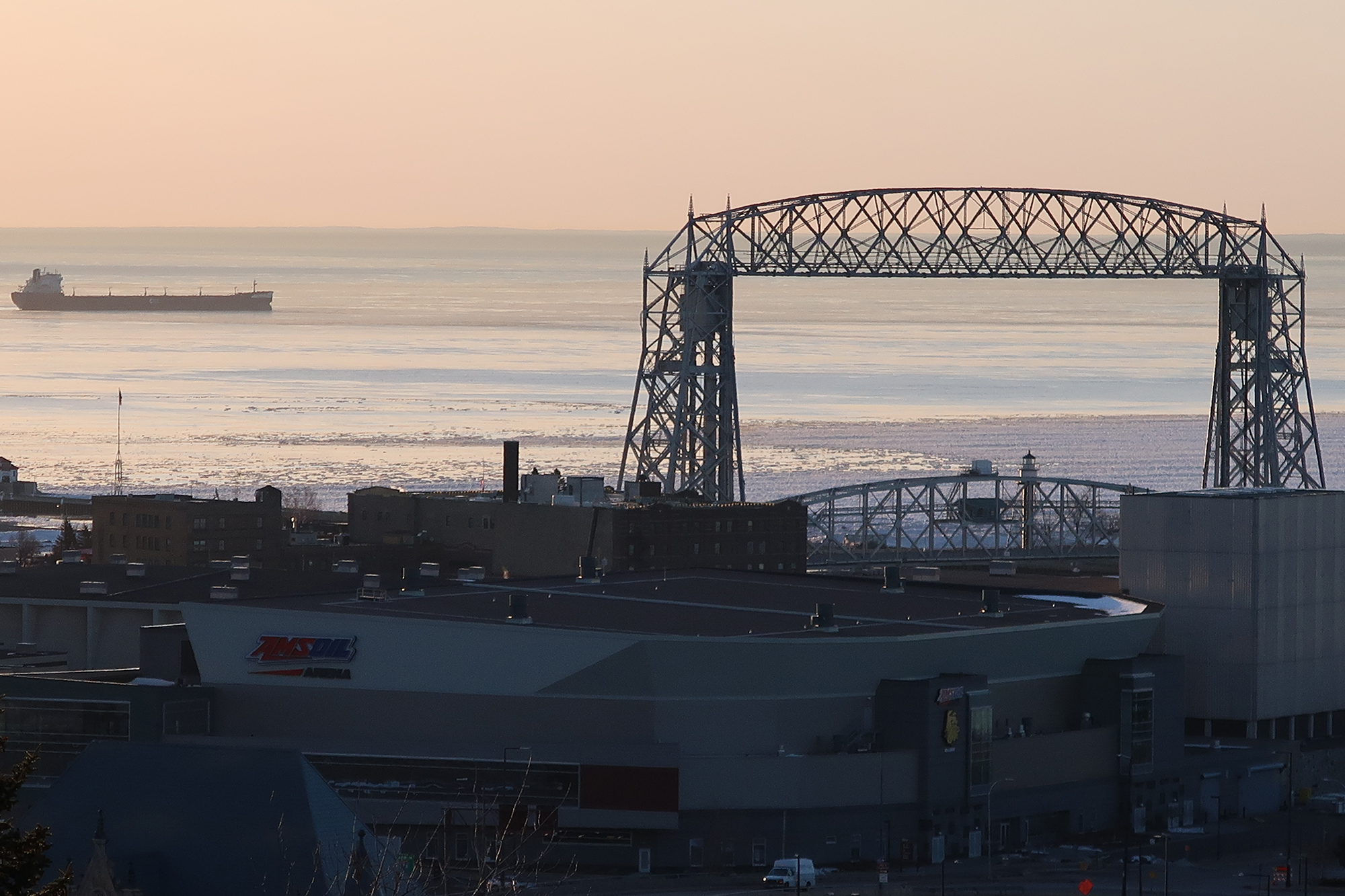 A vessel sits just beyond the Duluth Aerial Lift Bridge