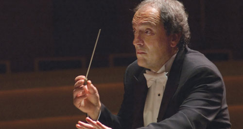Conductor John DeMain