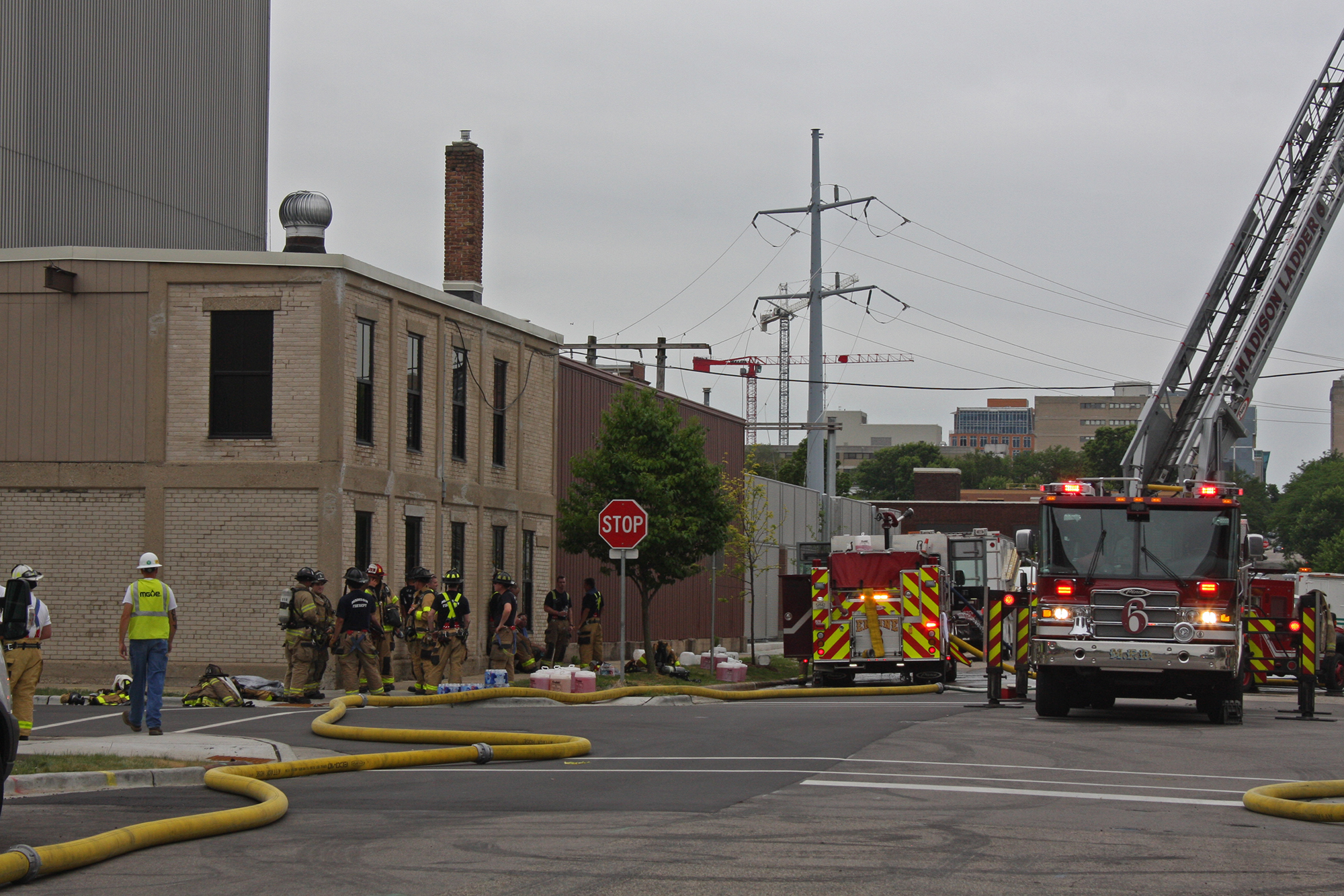 Madison firefighters and Madison Gas and Electric staff 