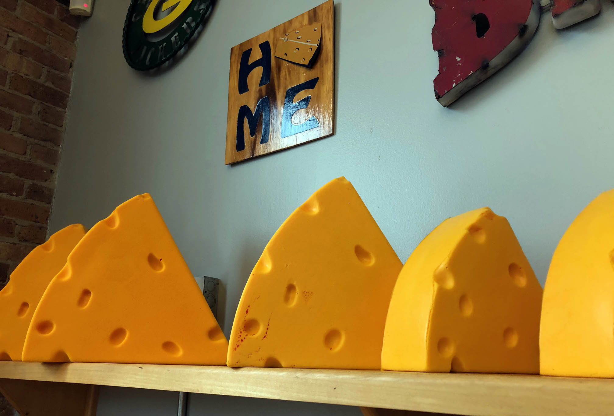 Classic cheesehead hats in the traditional wedge shape