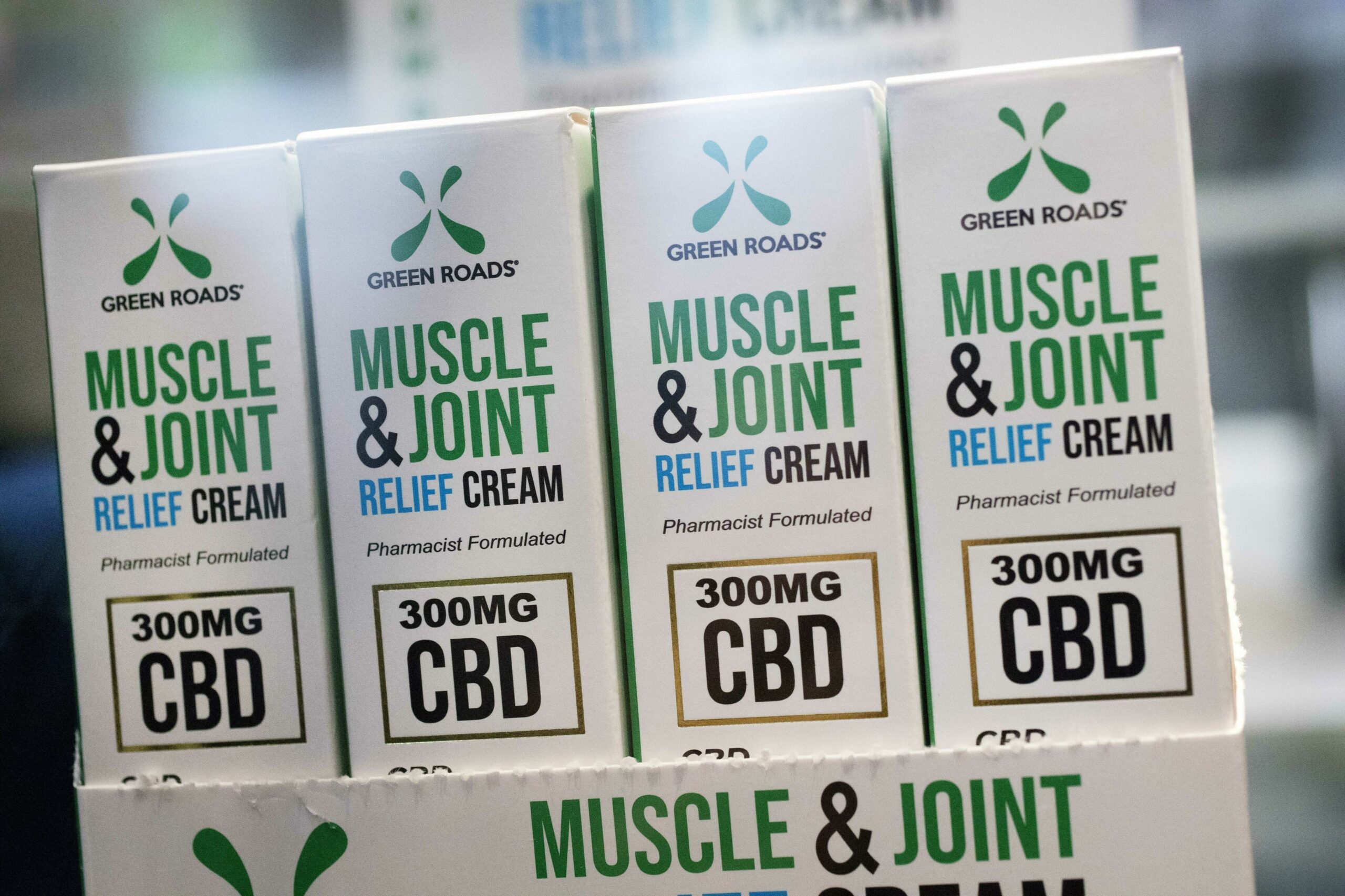Packages of CBD muscle and joint relief cream on display