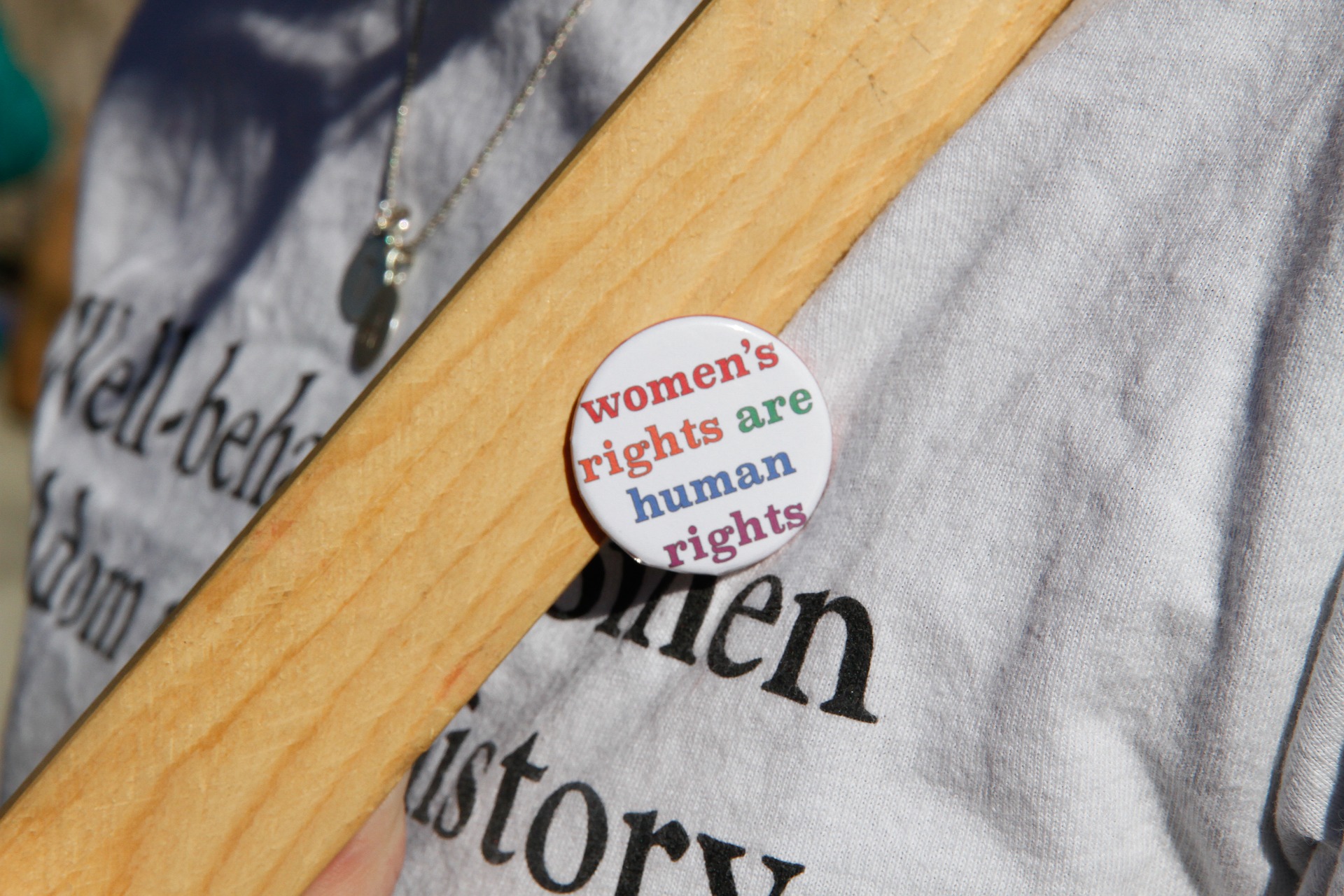 Women's rights are human rights lapel pin.