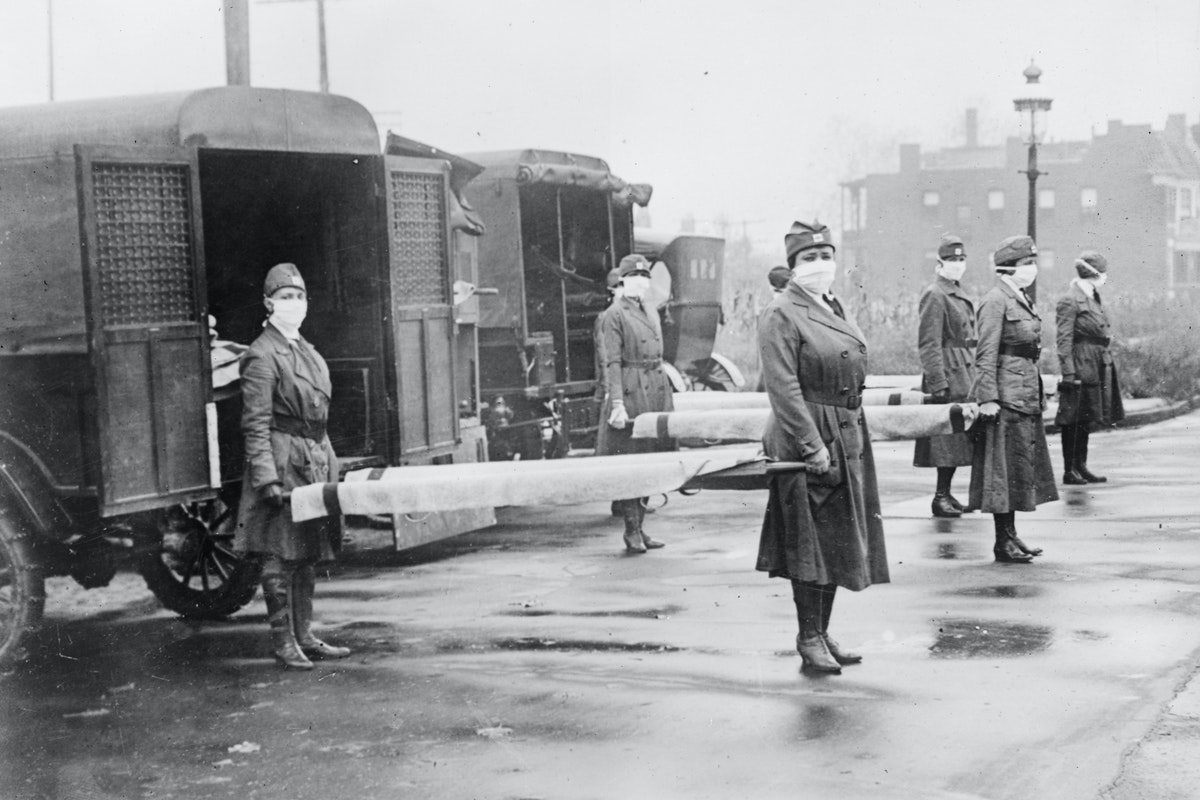 Red Cross workers holding stretchers during 1918 flu pandemic in St. Louis