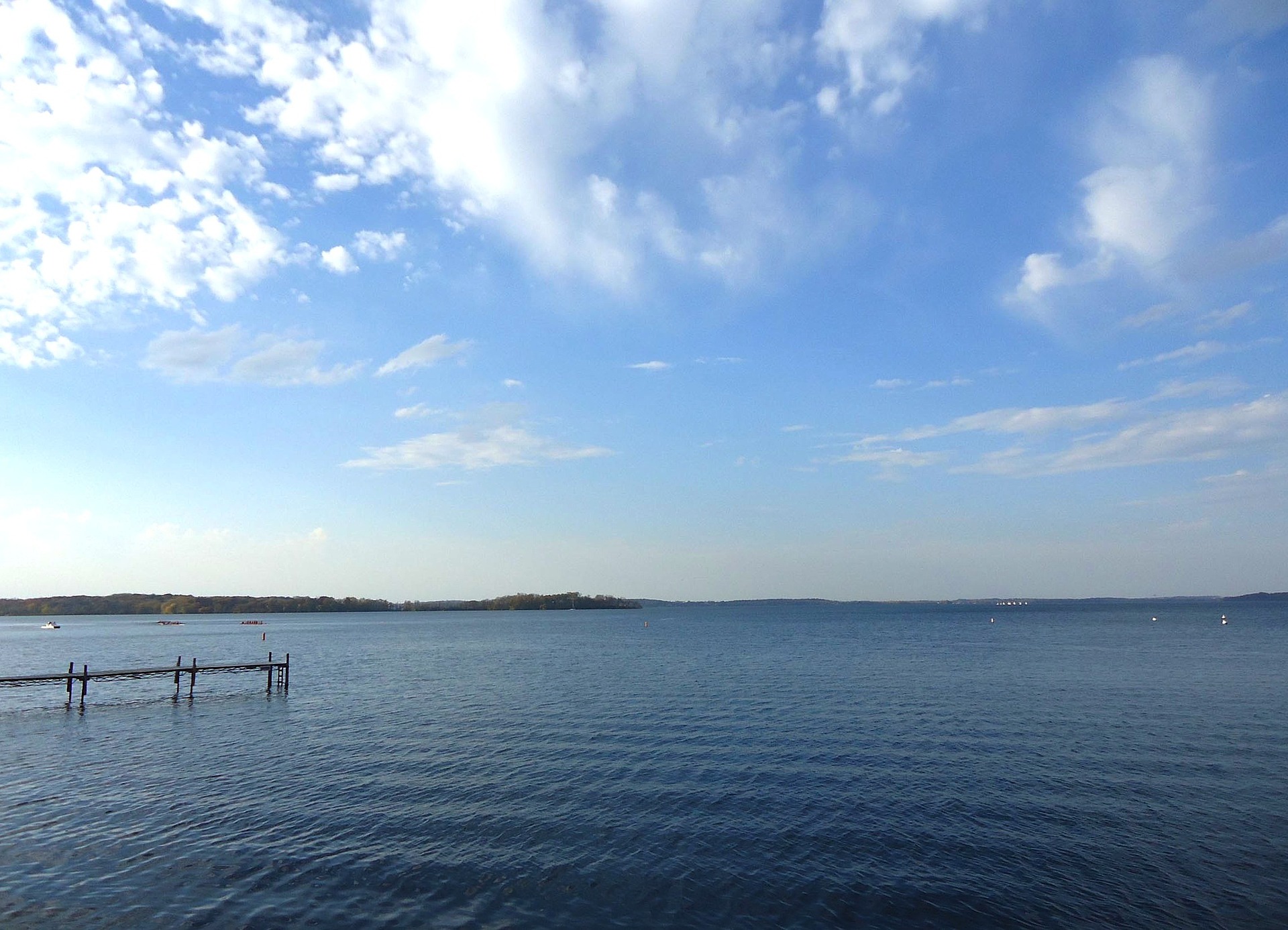 Calm lake with dock.
