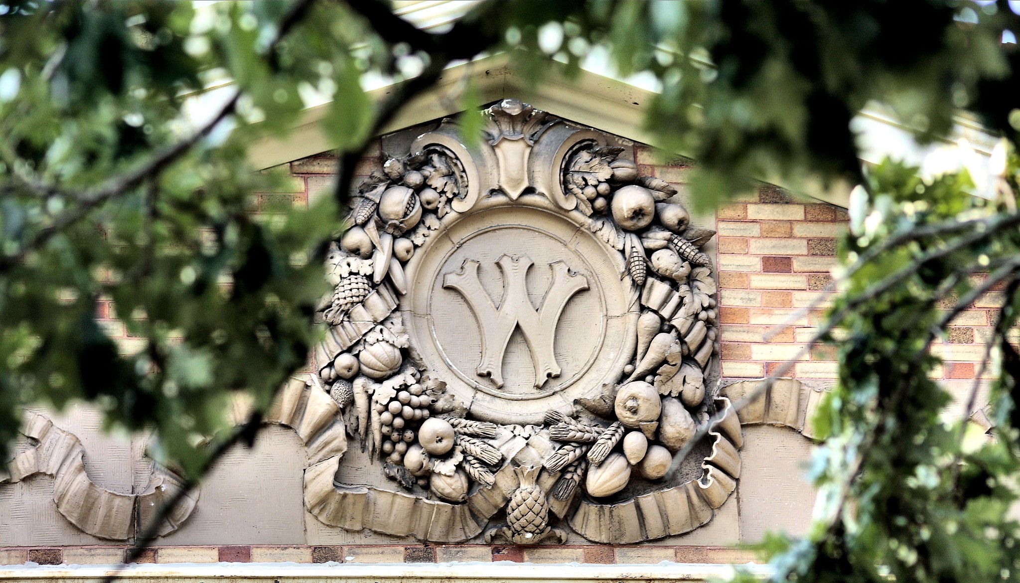 An old UW-Madison "W" insignia on Agricultural Hall