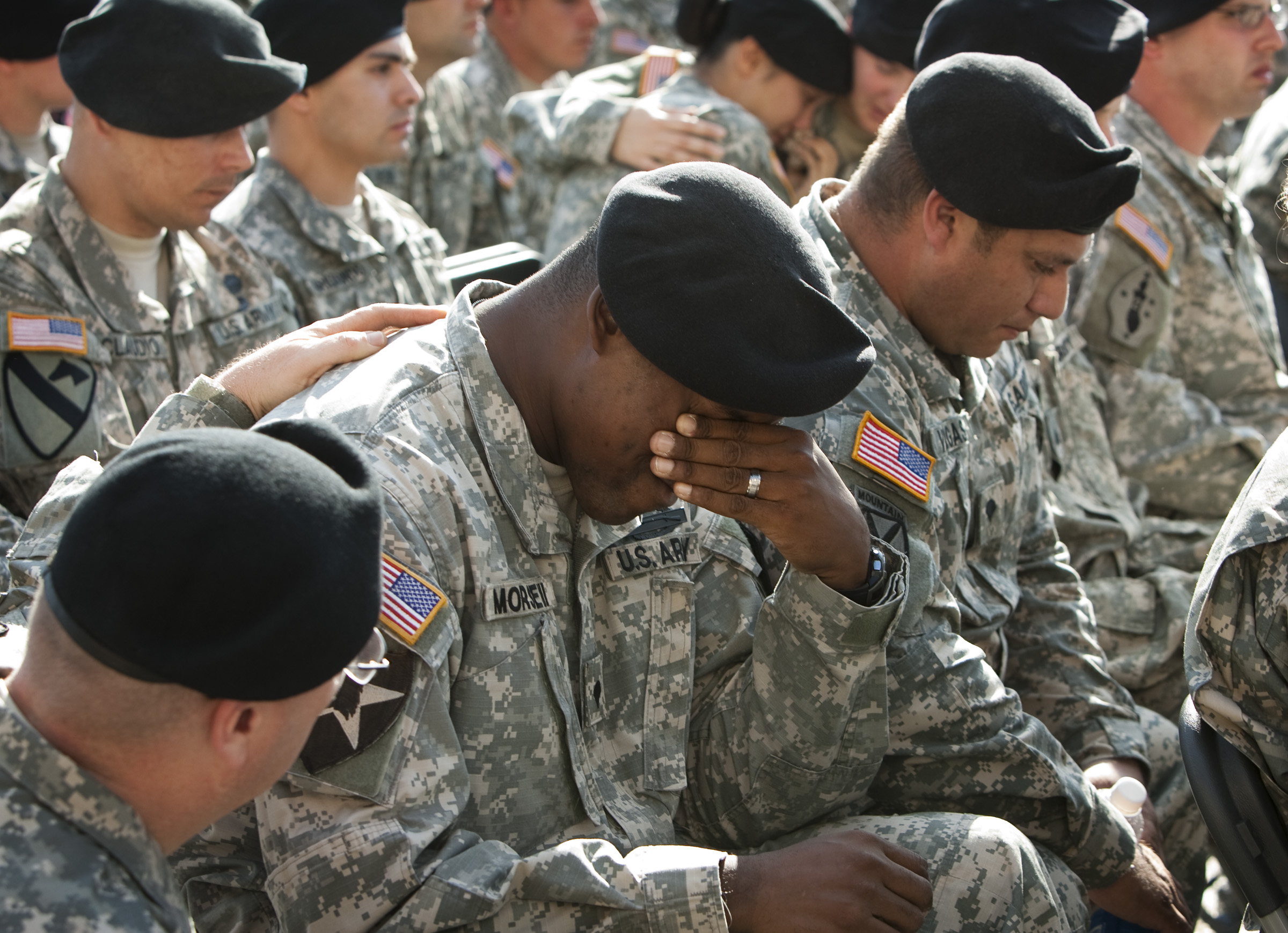 A soldier cries at a memorial service at Fort Hood, Texas