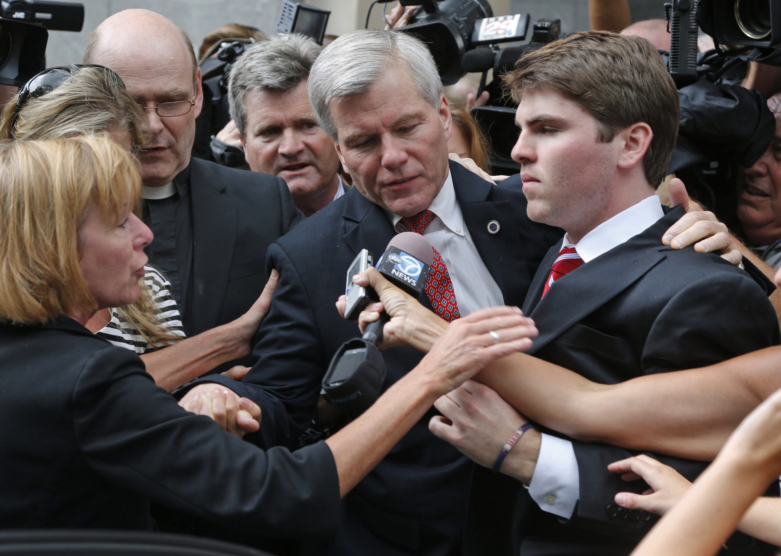 Bob McDonnell is mobbed by media after being convicted on multiple counts of corruption in Virginia.