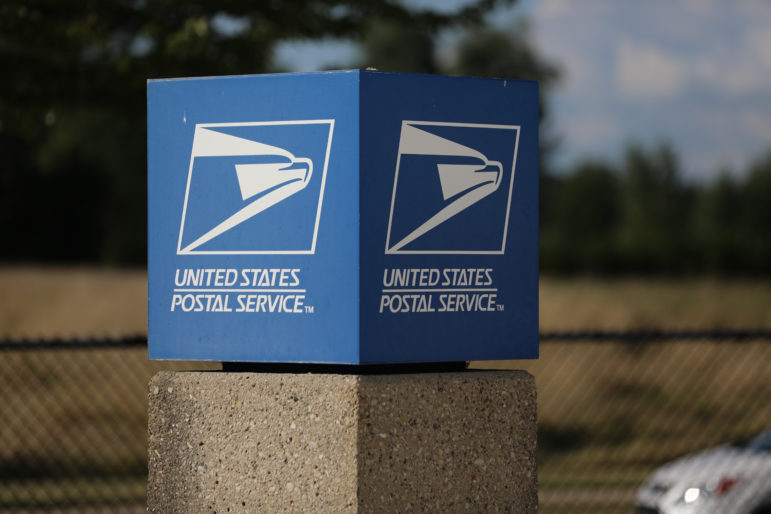 A U.S. Postal Service sign