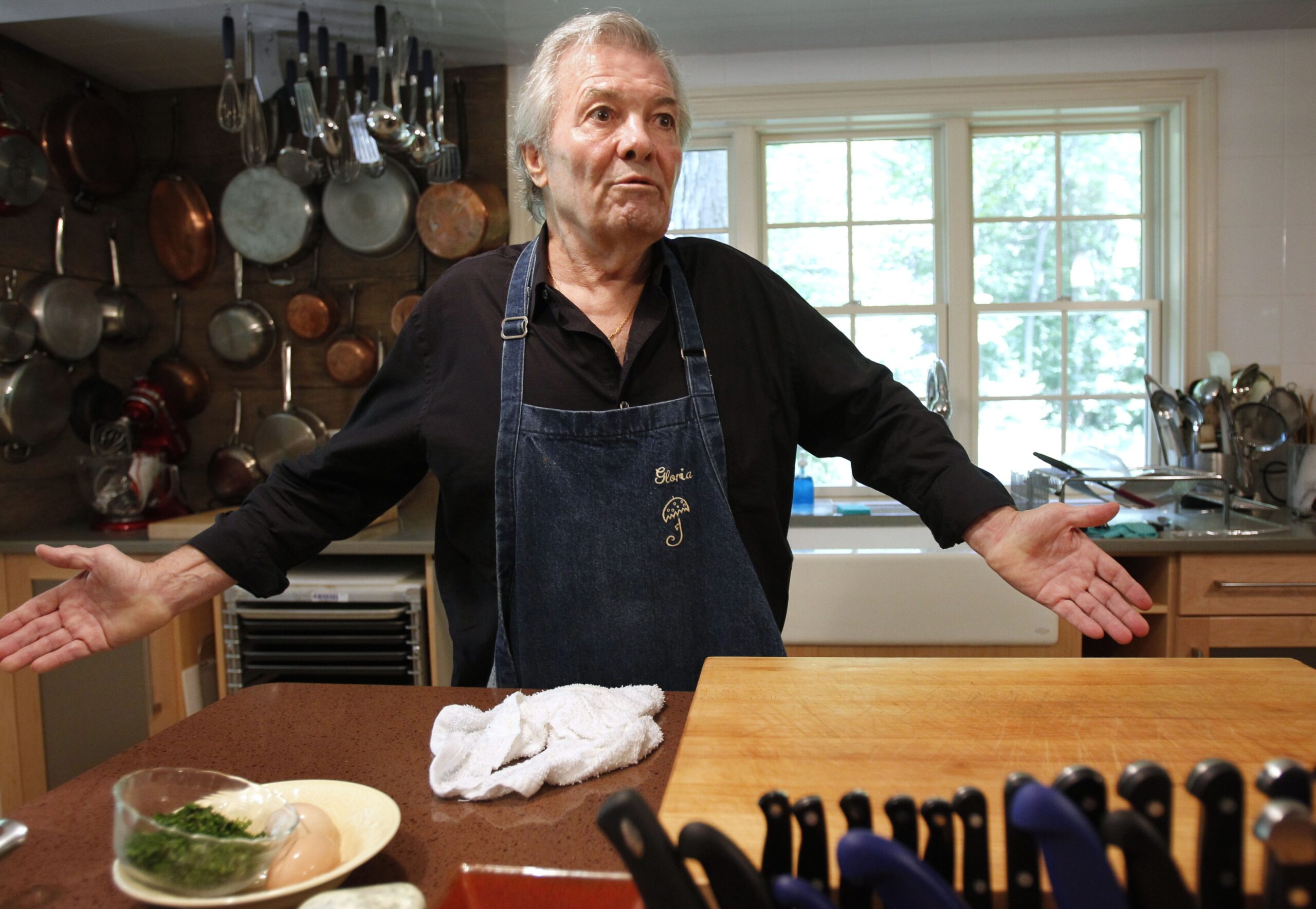 In this Tuesday, June 28, 2011 photo, chef Jacques Pepin speaks with a reporter at his home