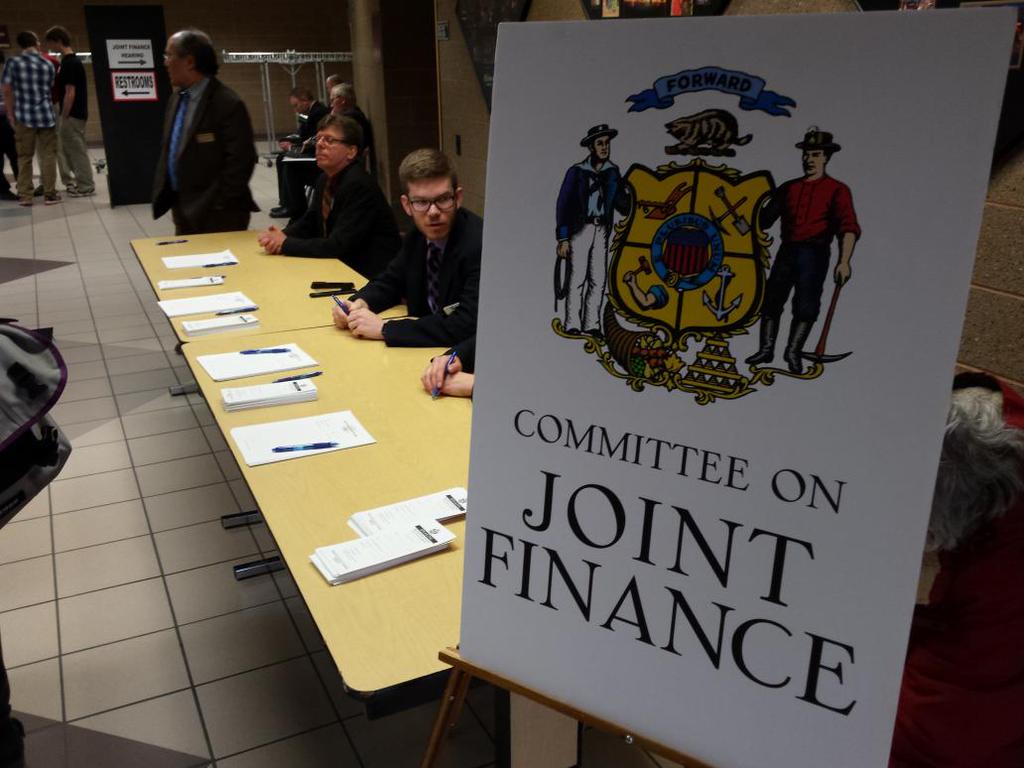 A poster with the Wisconsin crest that reads Committee on Joint Finance