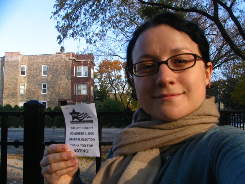 Young woman with proof she voted.