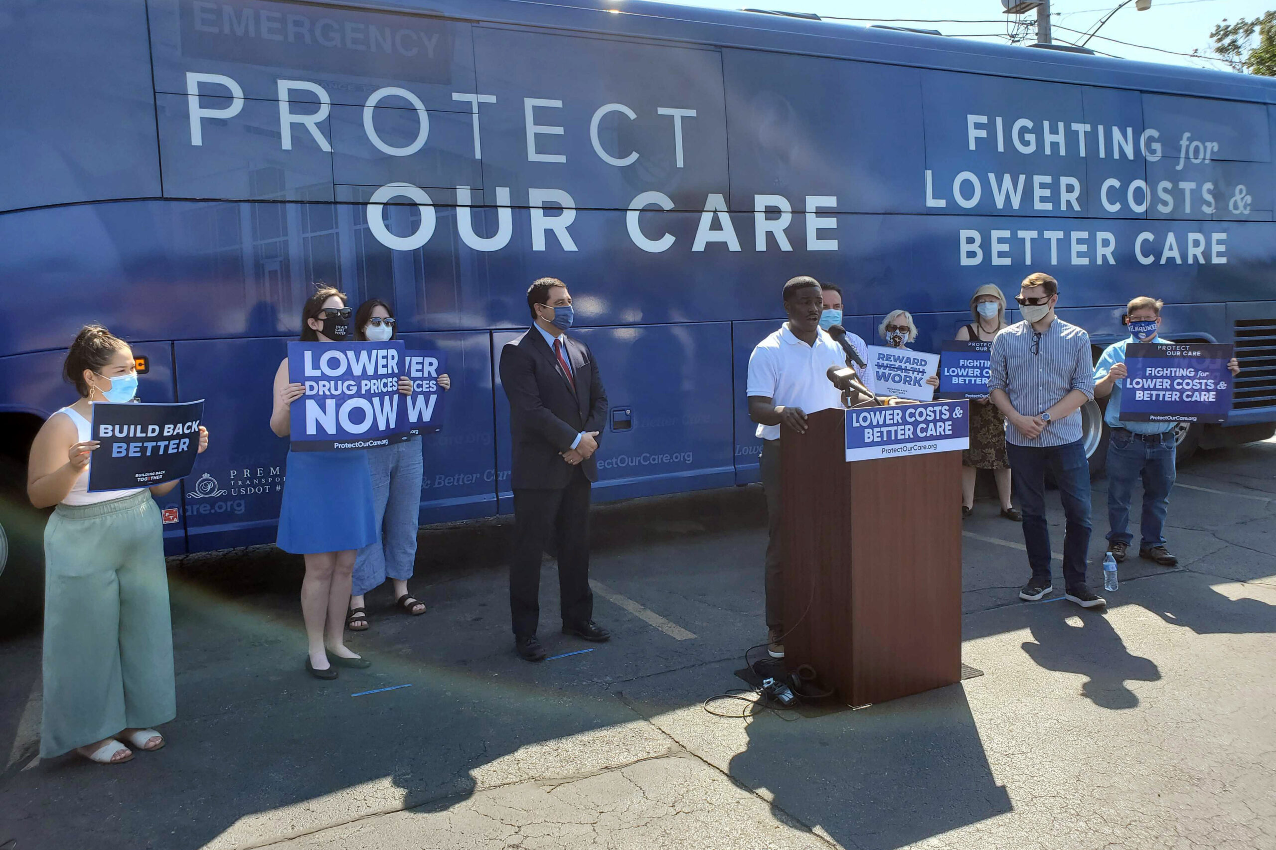 David Crowley speaks at an event calling for lower health care costs