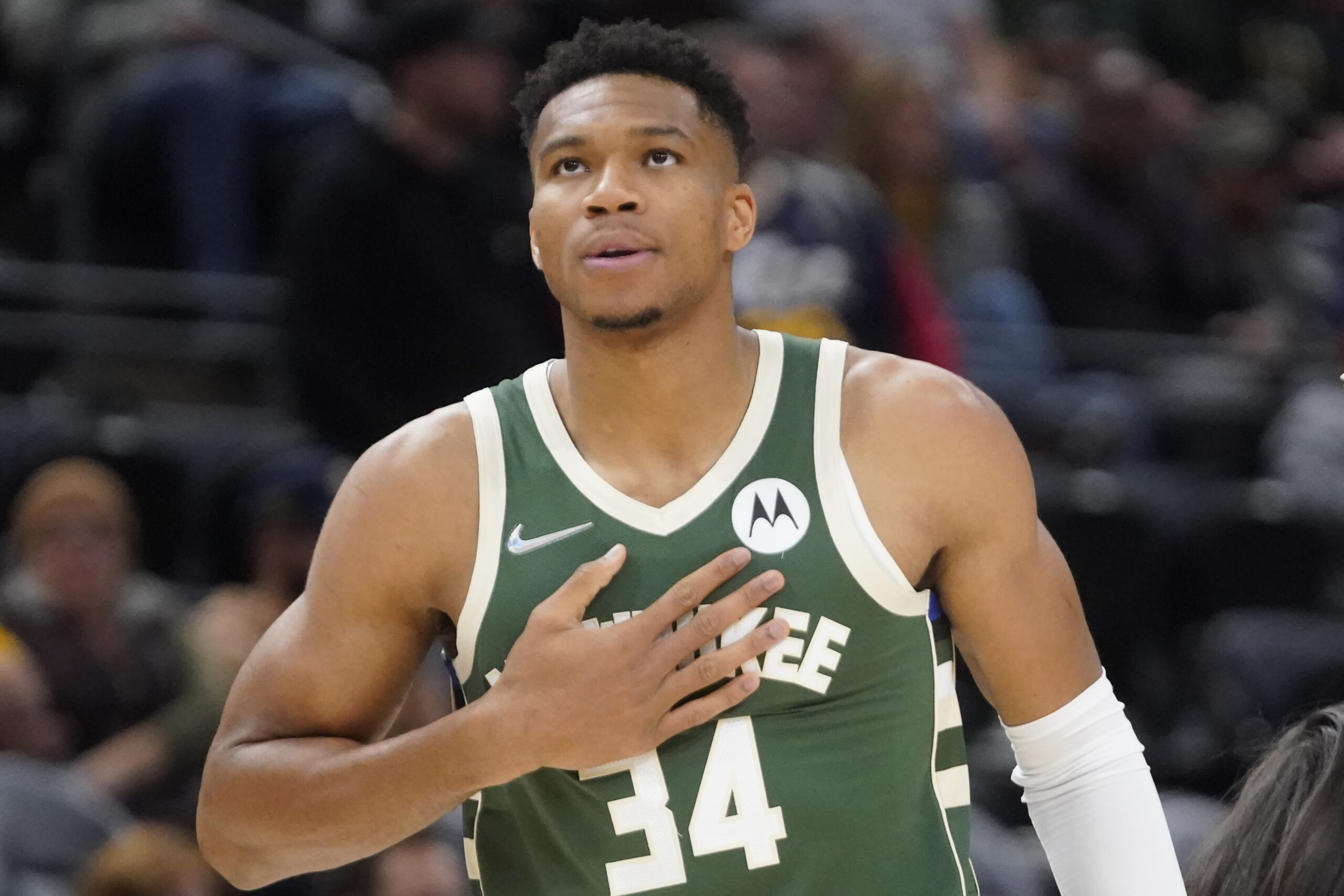 Giannis Antetokounmpo gestures during a preseason basketball game