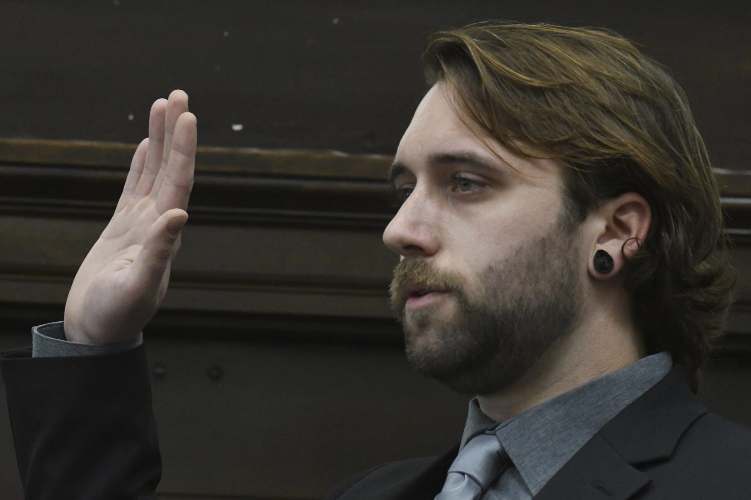 Gaige Grosskreutz is sworn in before he testifies about being shot in the right bicep during the Kyle Rittenhouse trial