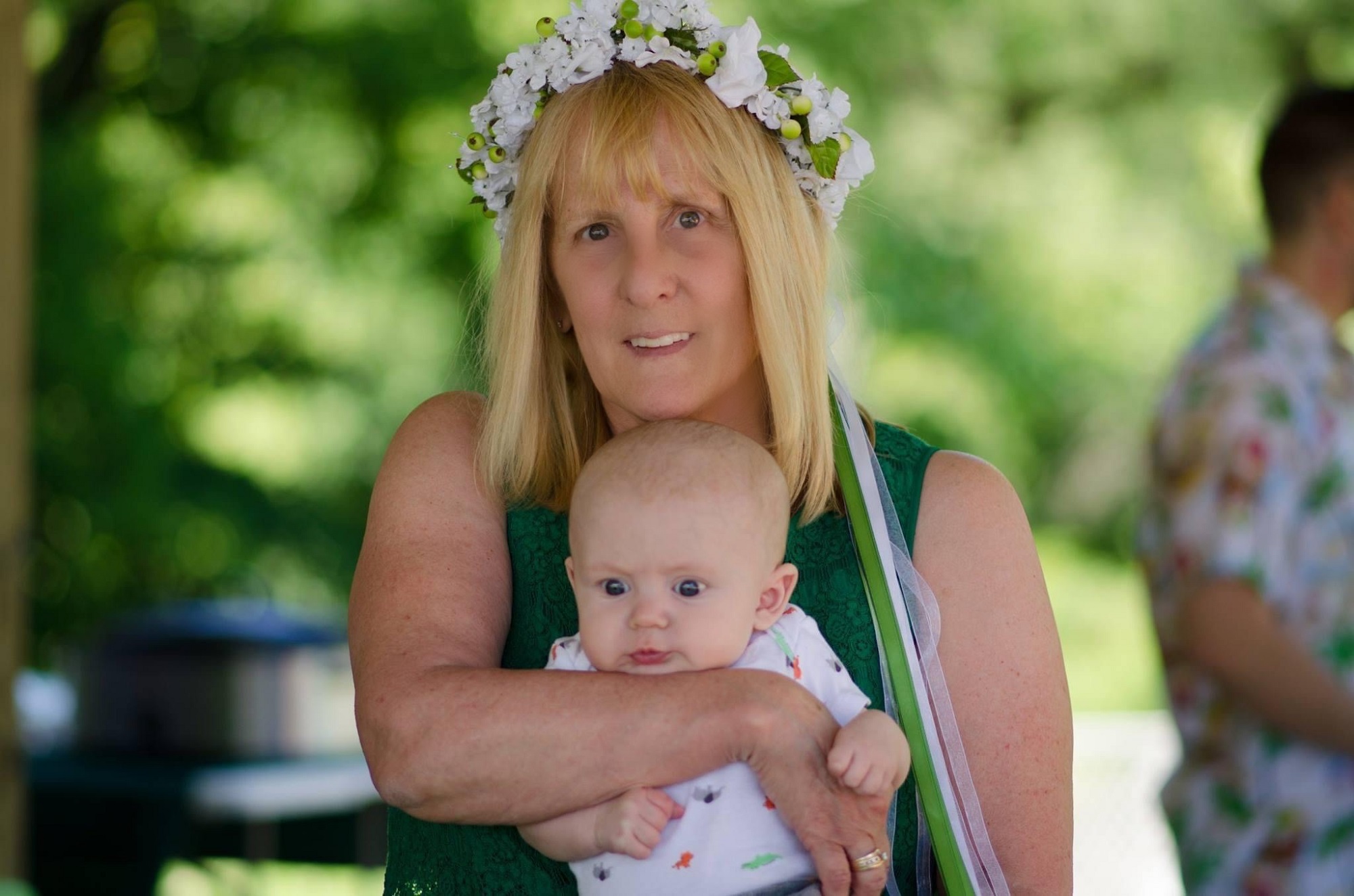 Poet Pam Gustafson of Milwaukee with her grandchild