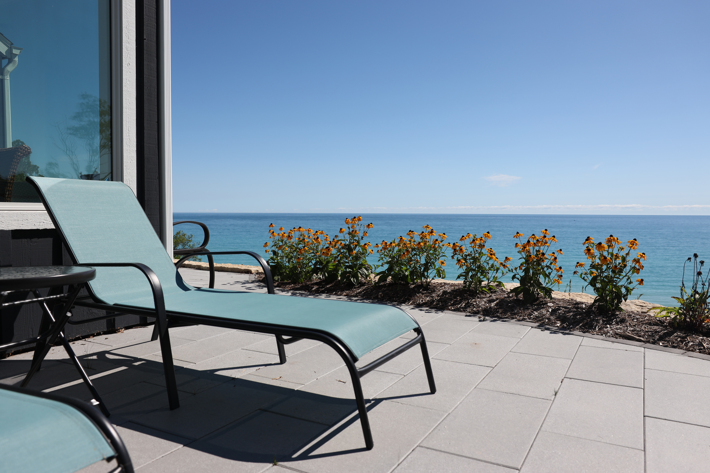 The patio of the house belonging to David Spector is seen on a 120-foot bluff in Mequon, Wis., that provides a panoramic view of Lake Michigan