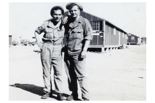 Ball turret gunner Wilbert "Pee Wee" Provost and Gene Monroe at the Army Air Force base in Pyote, Texas where Gene Monroe's crew first came together.