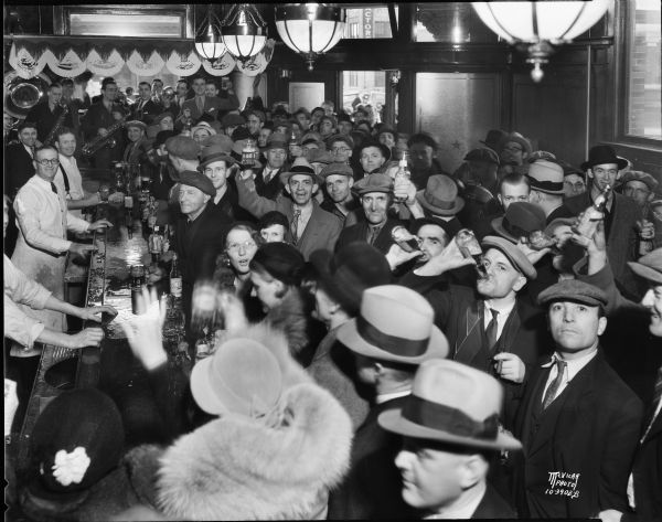 A crowd of people in the Fauerbach Brewery tavern celebrate the end of prohibition