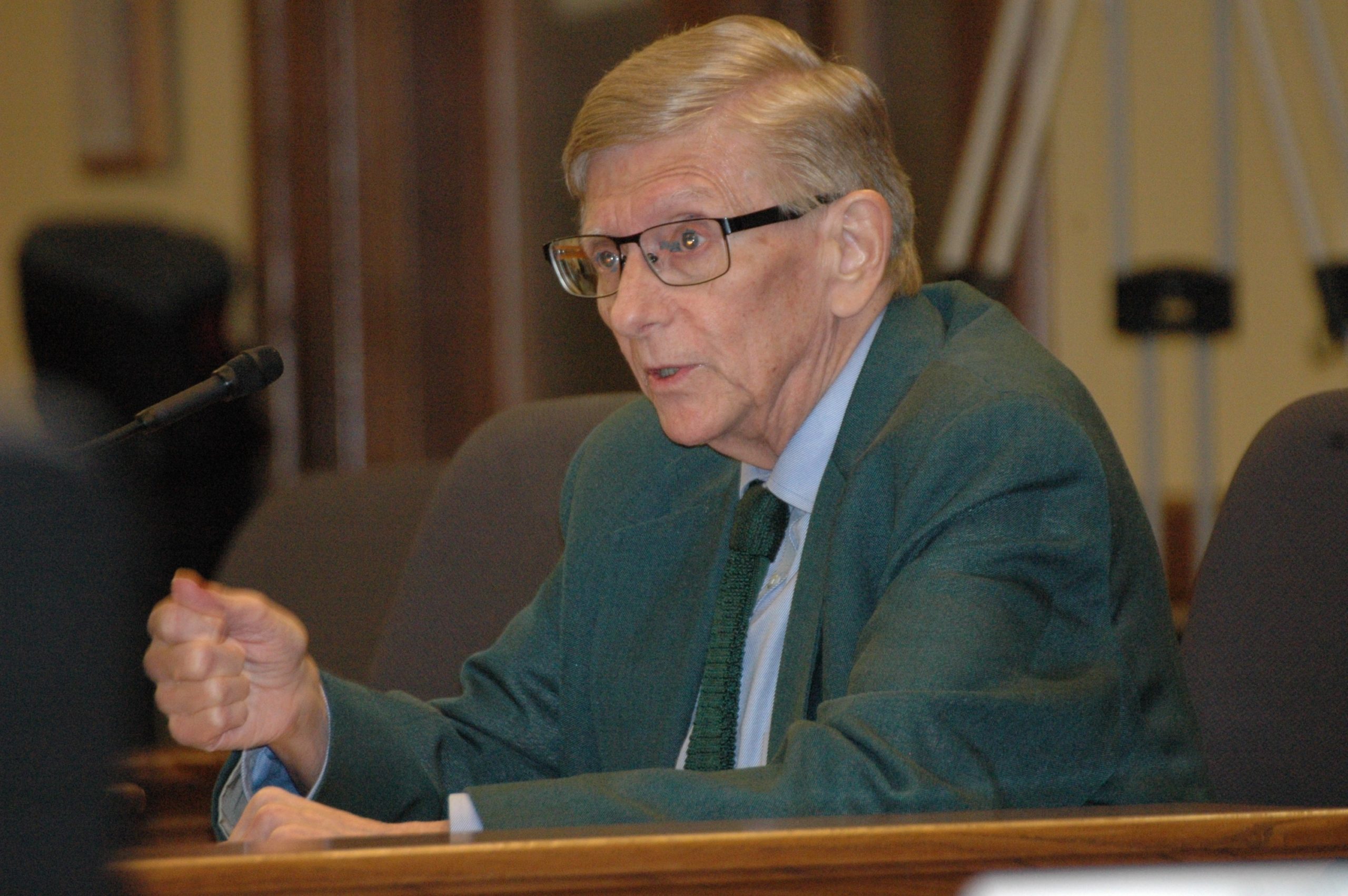 George Meyer testifies before a legislative committee