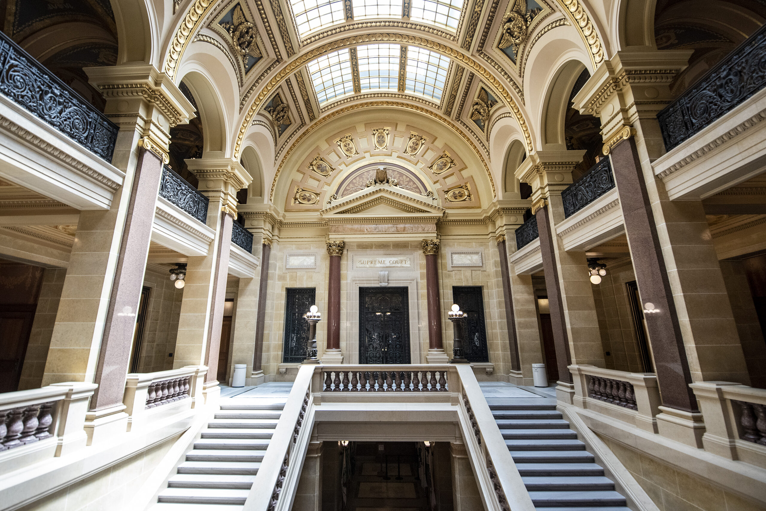 Stairs lead up to the Wisconsin Supreme Court inside the state capitol building.