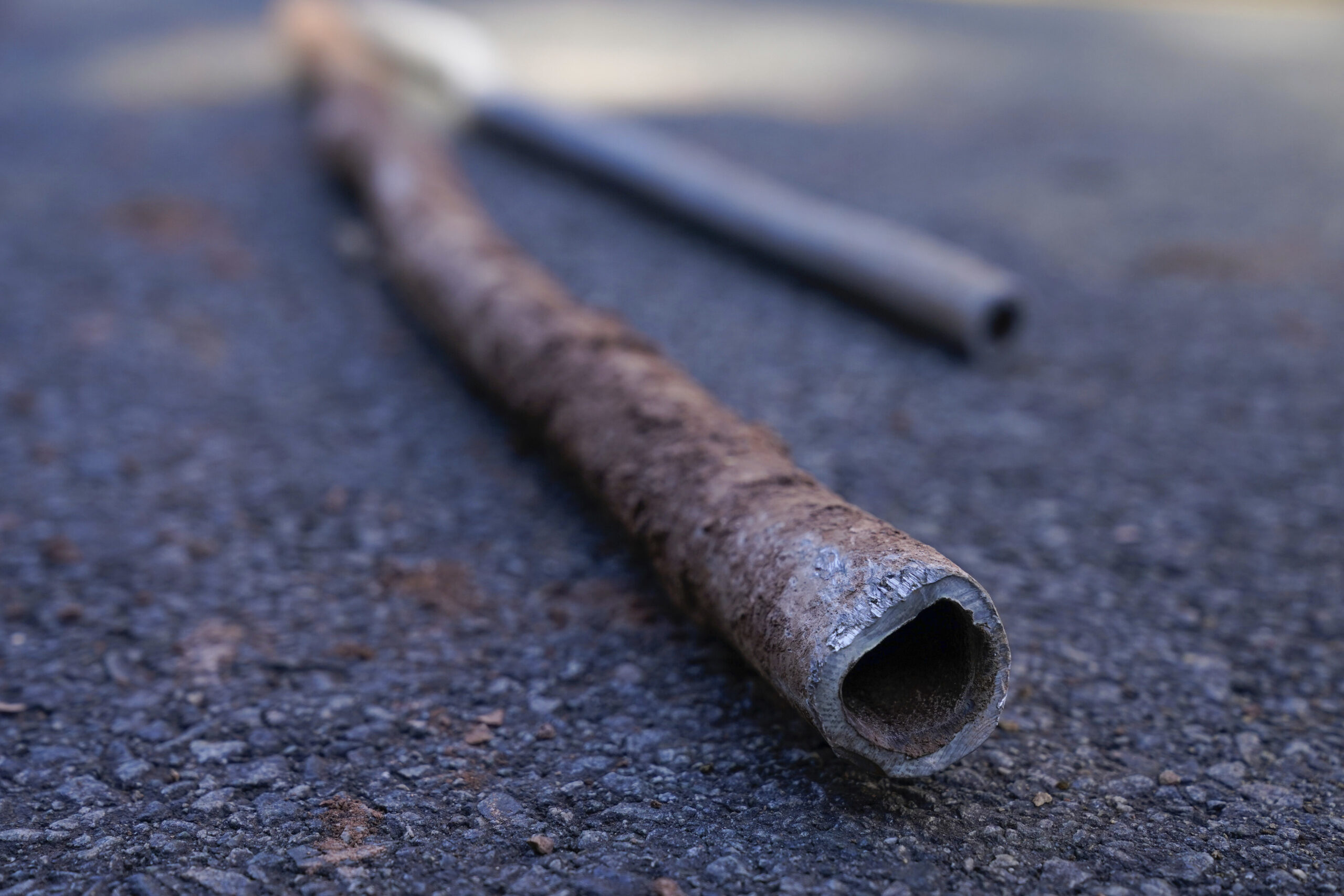 A lead pipe on the ground