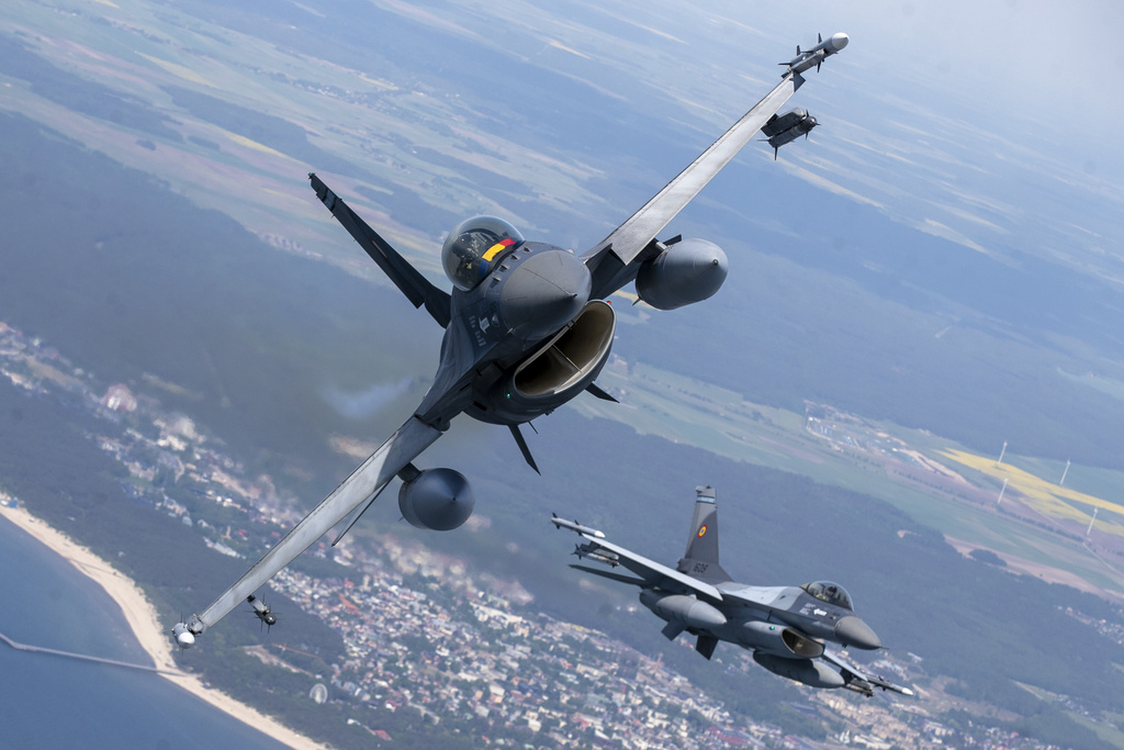 F-16 military fighter jets participate in NATO's Baltic Air Policing Mission over the Baltic Sea in Lithuanian airspace.
