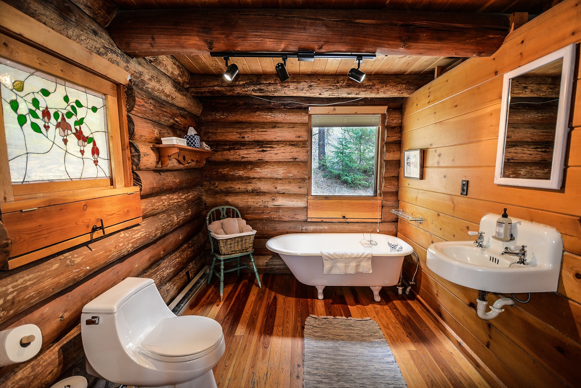 New bath fixture log cabin bathroom.