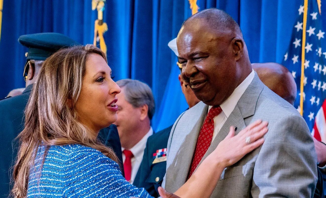 Republican National Committee chair Ronna McDaniel congratulates Gerard Randall, secretary of the Milwaukee Hosting Committee, after the signing of the official document selecting Milwaukee to host the 2024 Republican National Convention