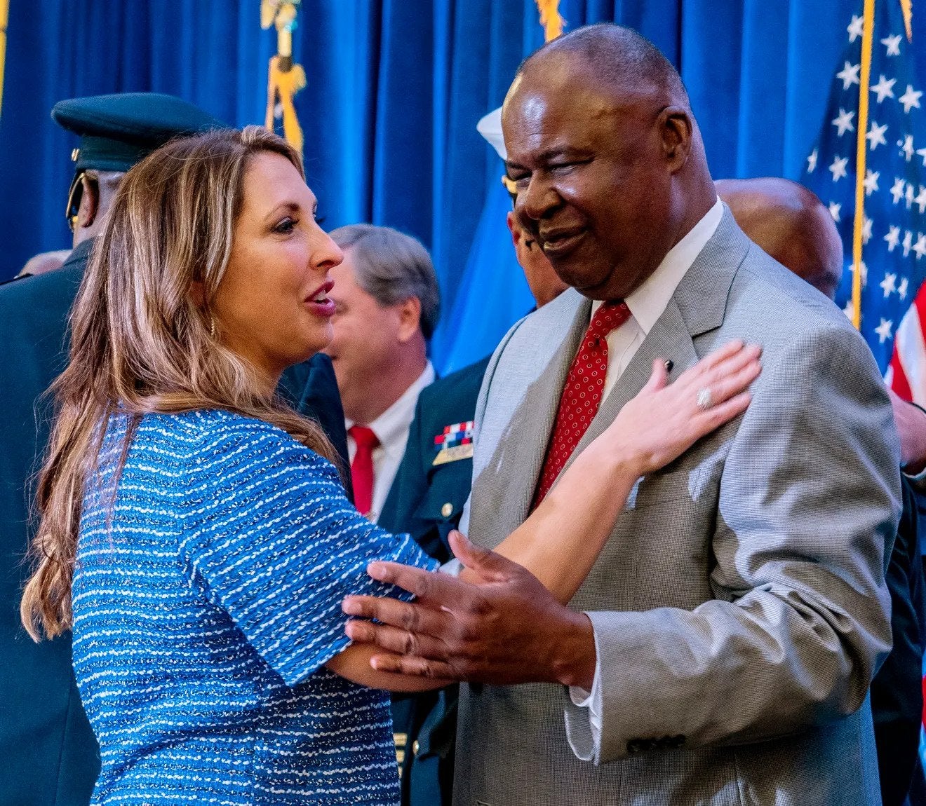 Republican National Committee chair Ronna McDaniel congratulates Gerard Randall, secretary of the Milwaukee Hosting Committee, after the signing of the official document selecting Milwaukee to host the 2024 Republican National Convention