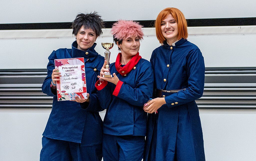 A group dressing as characters from the anime "Jujutsu Kaisen" display an award on Aug. 21, 2022. Stéphane Gallay/CC 2.0 via Wikimedia Commons