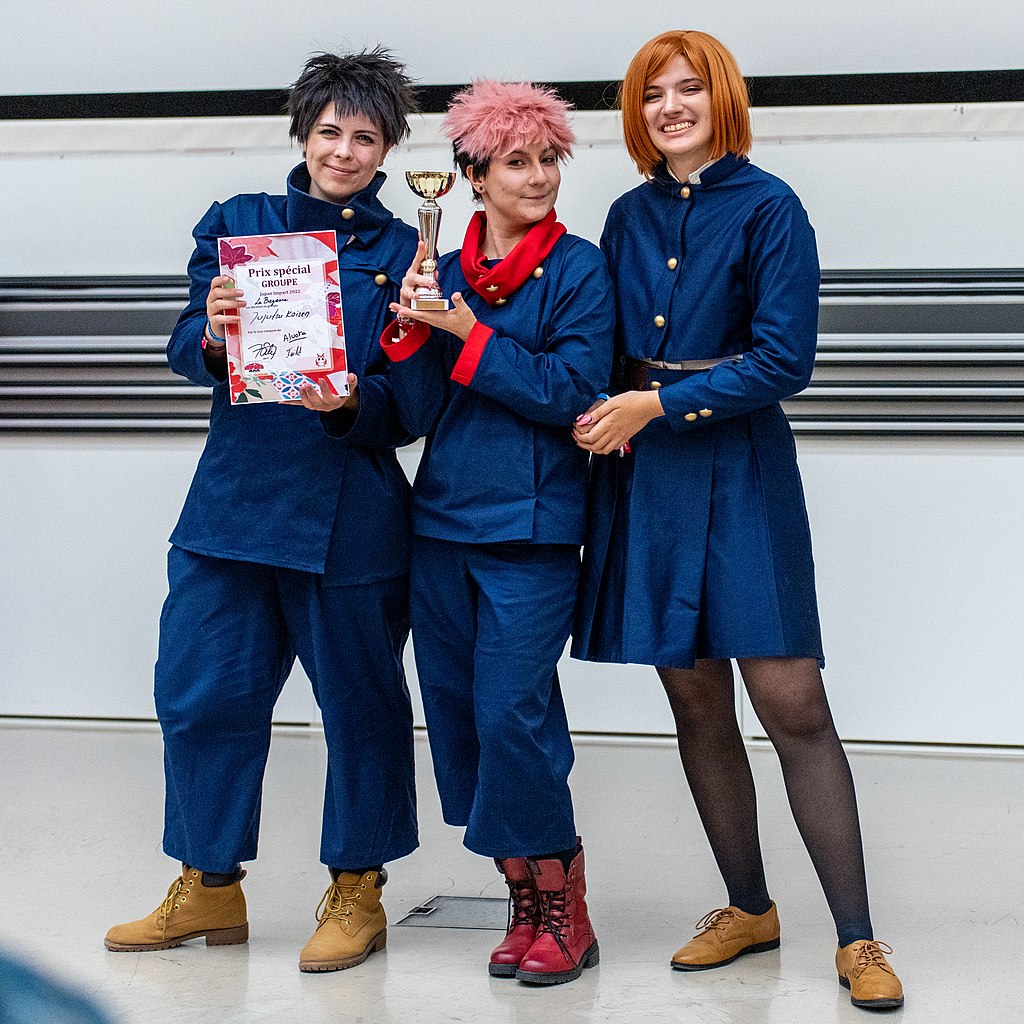 A group dressing as characters from the anime "Jujutsu Kaisen" display an award on Aug. 21, 2022. Stéphane Gallay/CC 2.0 via Wikimedia Commons