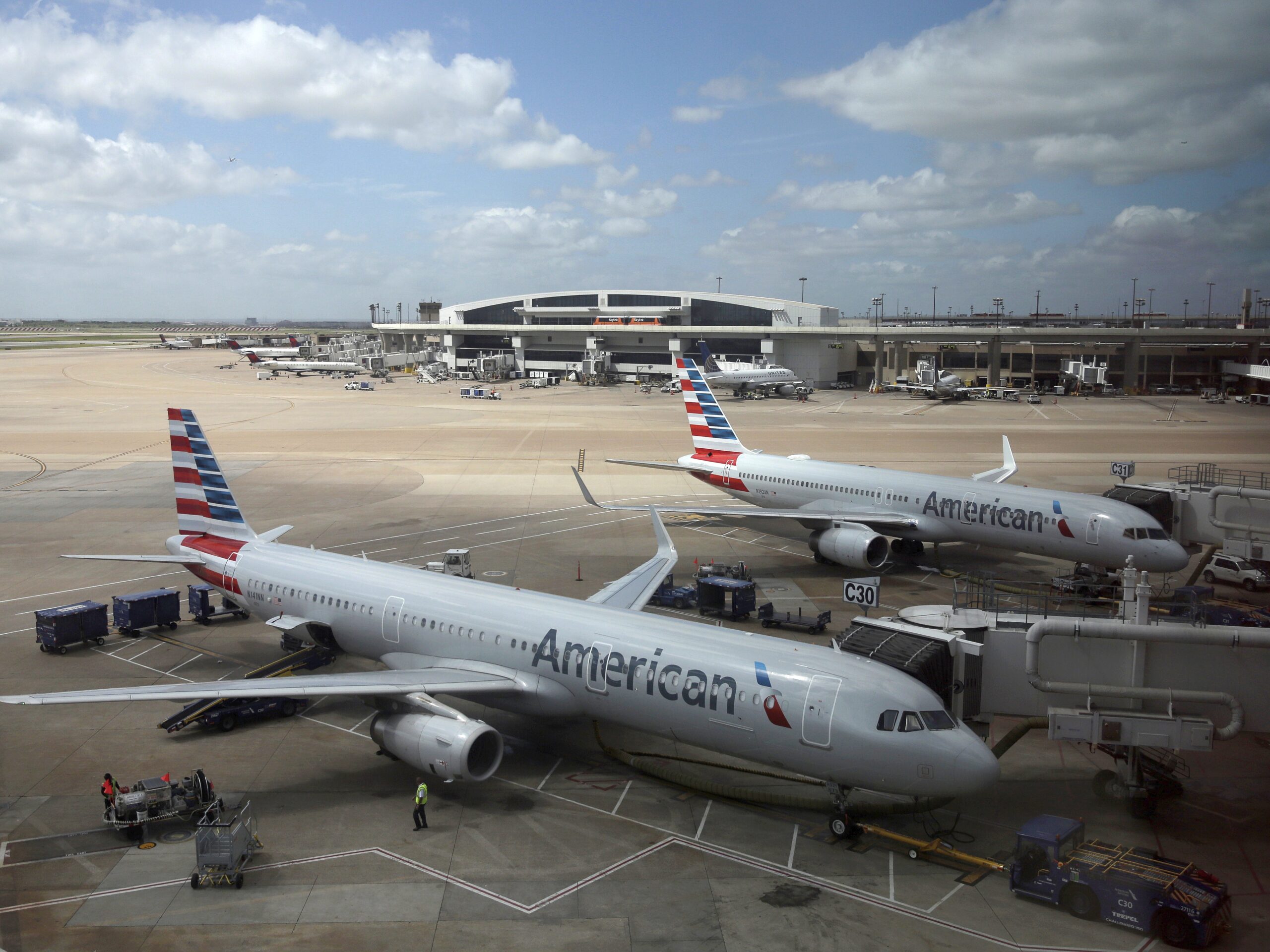American Airlines faces a discrimination suit after removing 8 Black men from flight