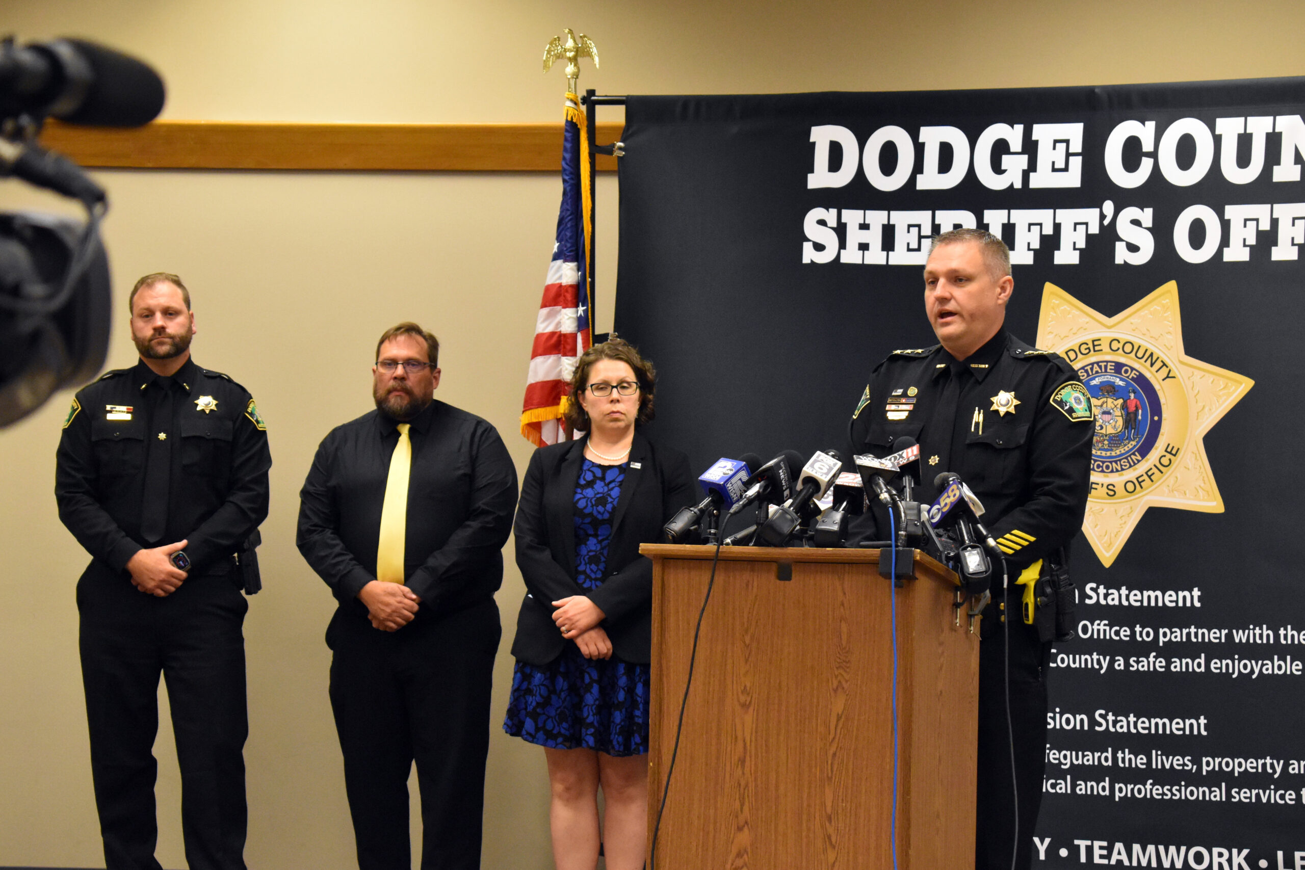 Dodge County Sheriff Dale Schmidt speaks at a press conference.