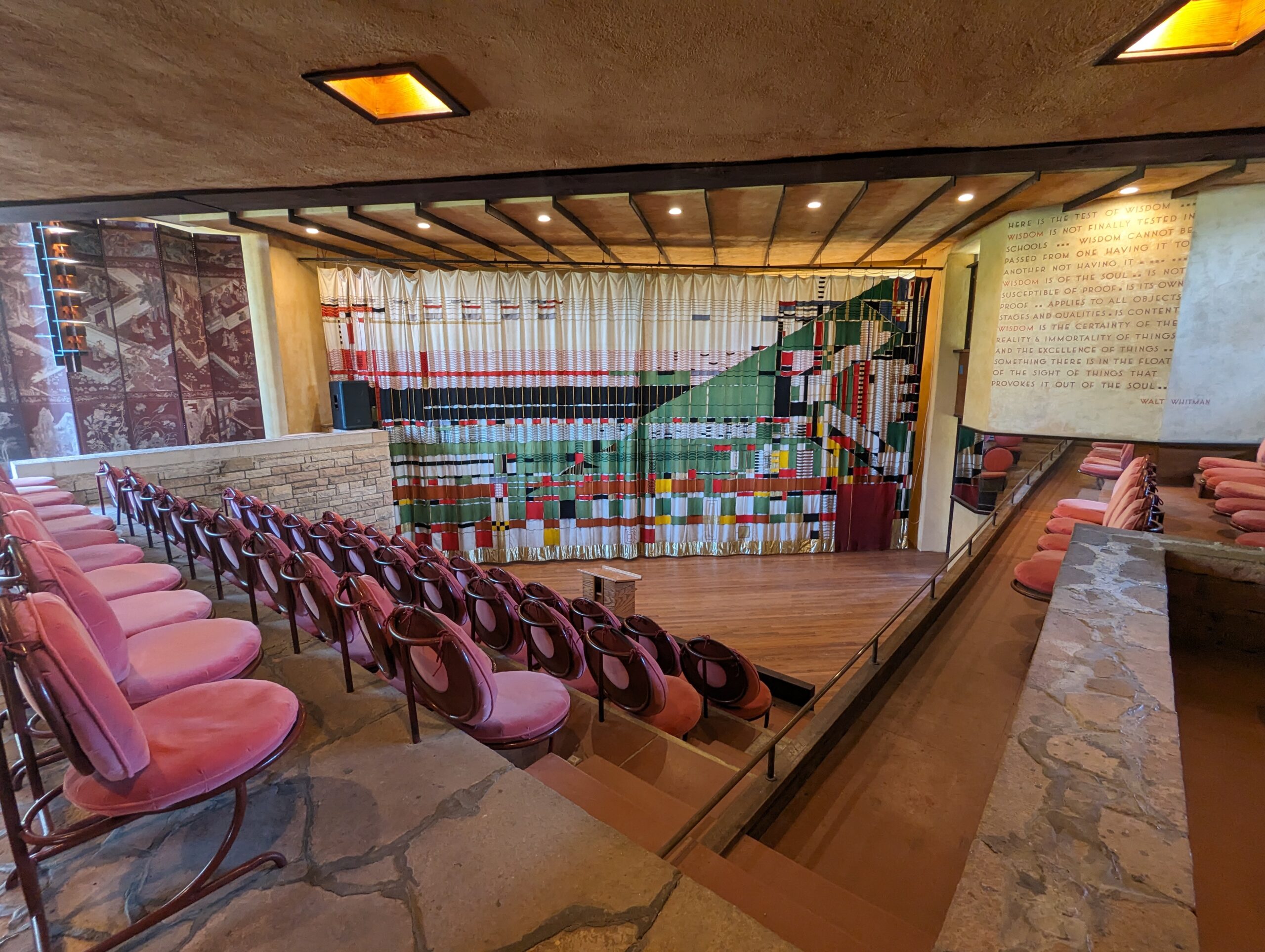 The newly renovated theater space at the Taliesin compound features a colorful, well-known curtain