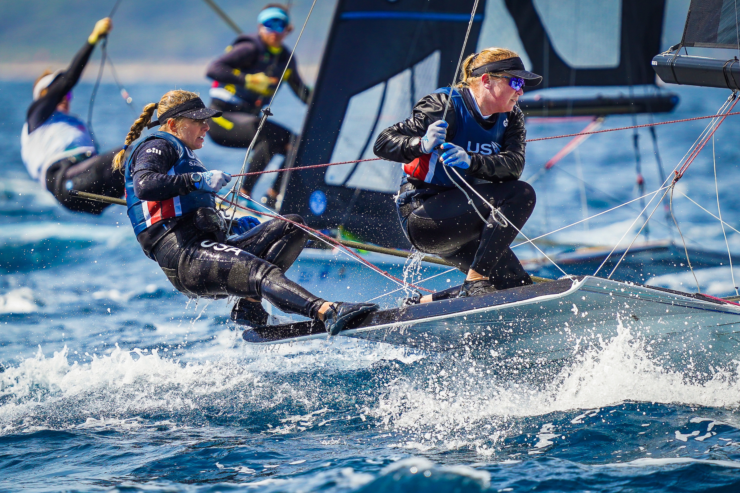 Stephanie Roble and Maggie Shea race on their 49erFX sailboat. (Courtesy of US Sailing)
