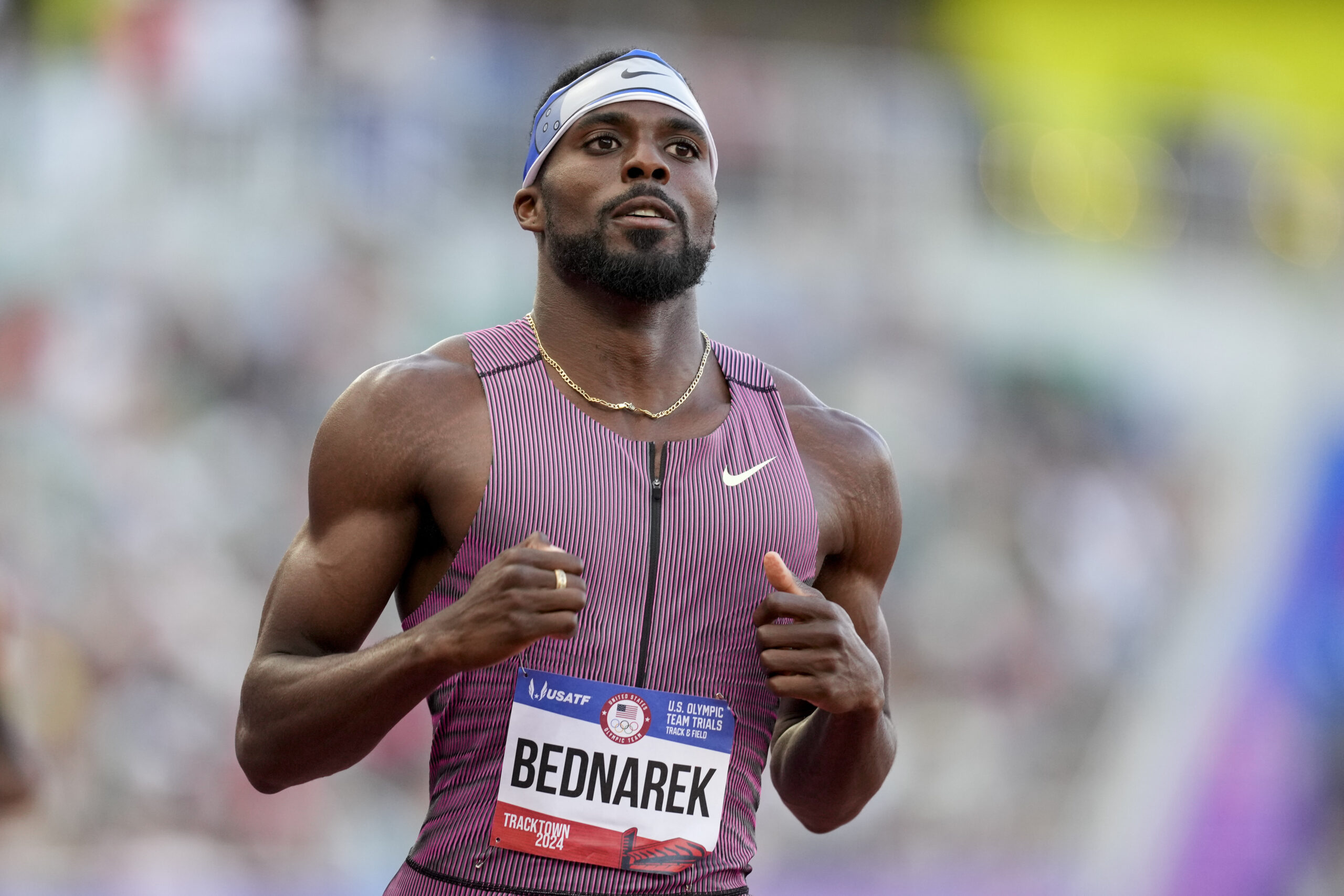 Kenny Bednarek wins a heat in the men's 200-meter run during the U.S. Track and Field Olympic Team Trials Thursday, June 27, 2024, in Eugene, Ore. (AP Photo/Charlie Neibergall)