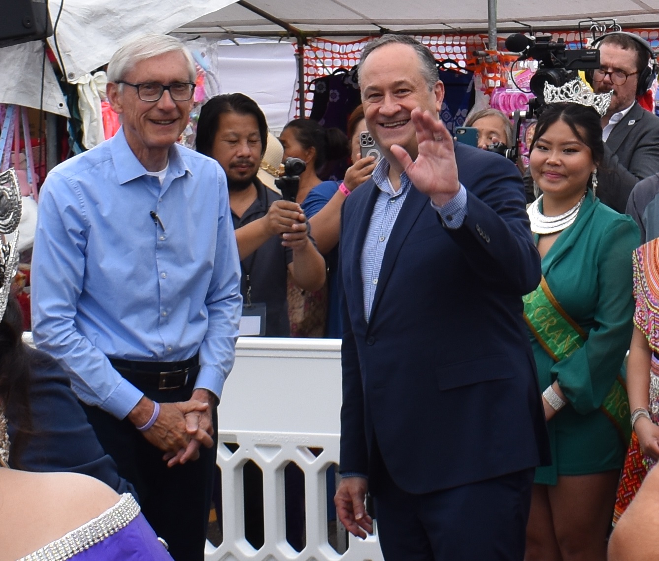 Second gentleman Doug Emhoff stands with Wisconsin Gov. Tony Evers at the Hmong Wausau Festival at the People's Sports Complex Saturday, July 27, 2024. Rob Mentzer/WPR