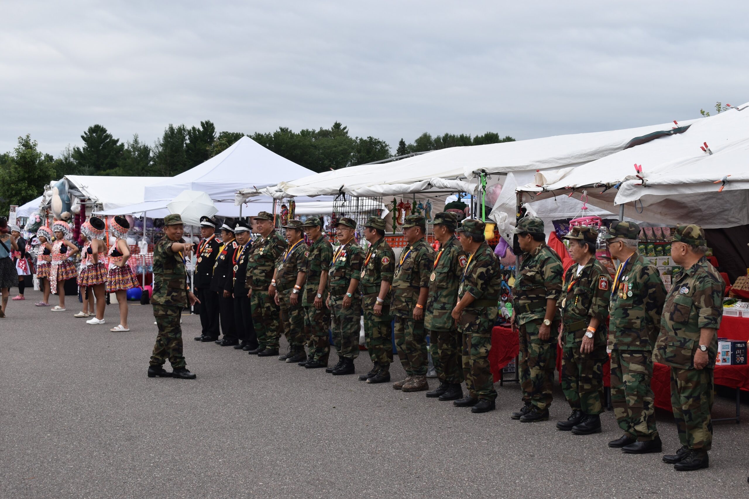 Hmong veterans of the Vietnam War, who fought alongside American troops, were part of the opening ceremonies for the Hmong Wausau Festival. Rob Mentzer
