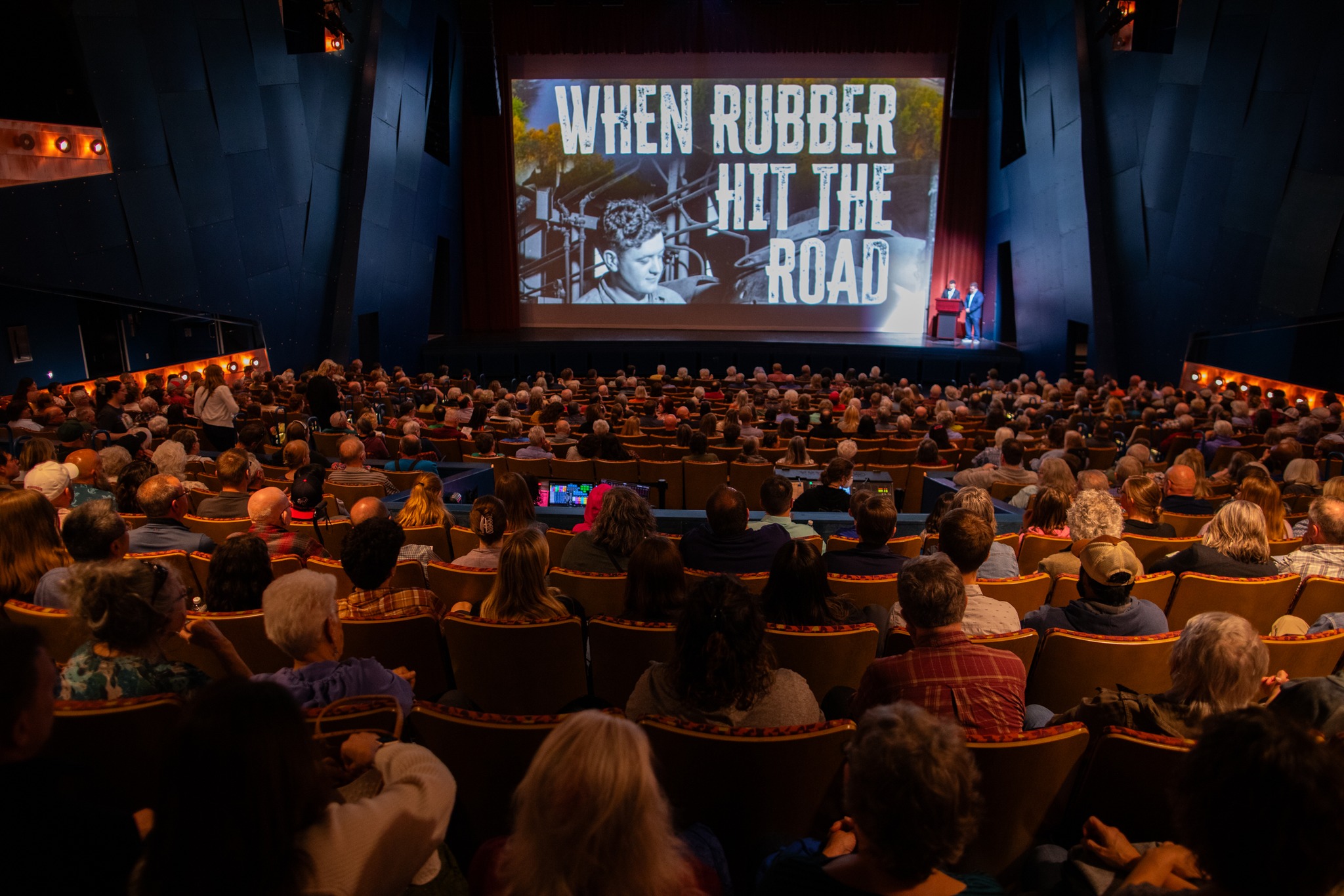 Filmmakers Steve Dayton and B.J. Hollars address the audience at a screening of their documentary, "When Rubber Hits the Road." Photo courtesy of Justin Patchin