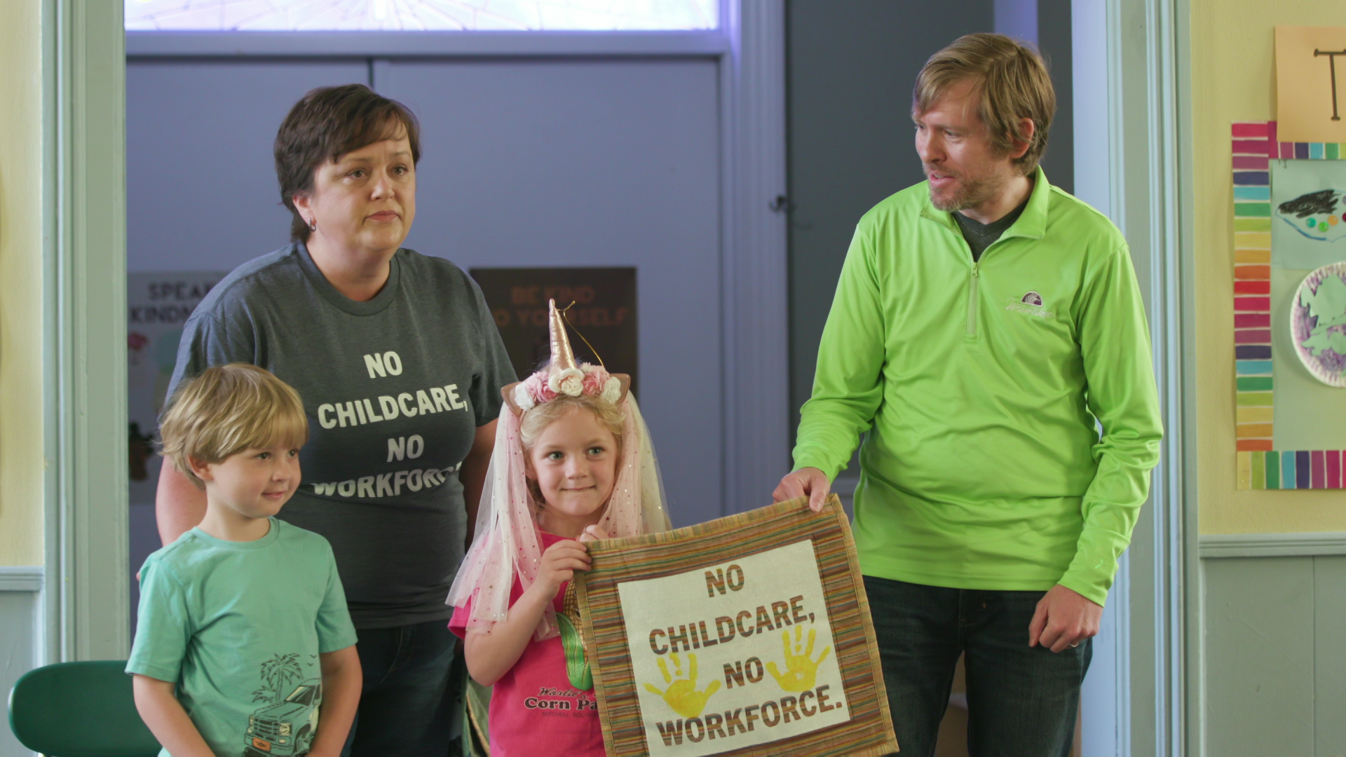 Heather Murray, Robert McPherson and two children participate in "A Day Without Childcare."