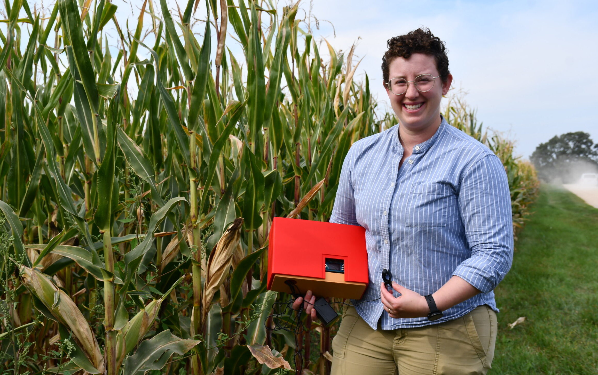 Entomologist Emily Bick holds her “insect eavesdropper.”