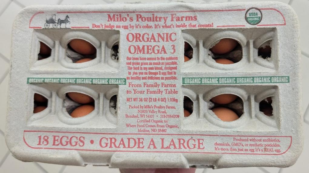 The top of an egg carton showing the Milo's Poultry Farms brand