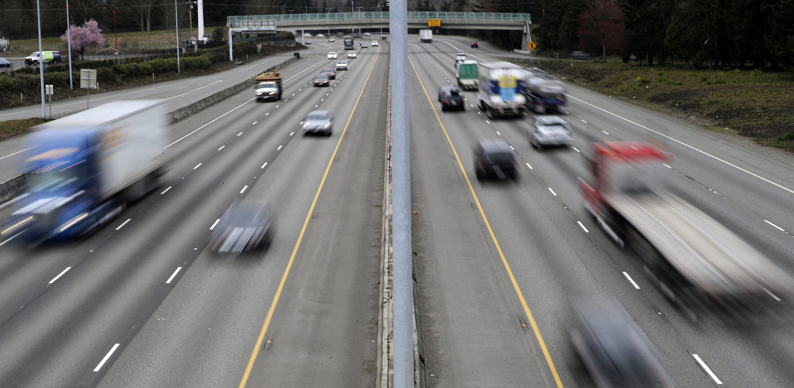 Cars and trucks travel on Interstate