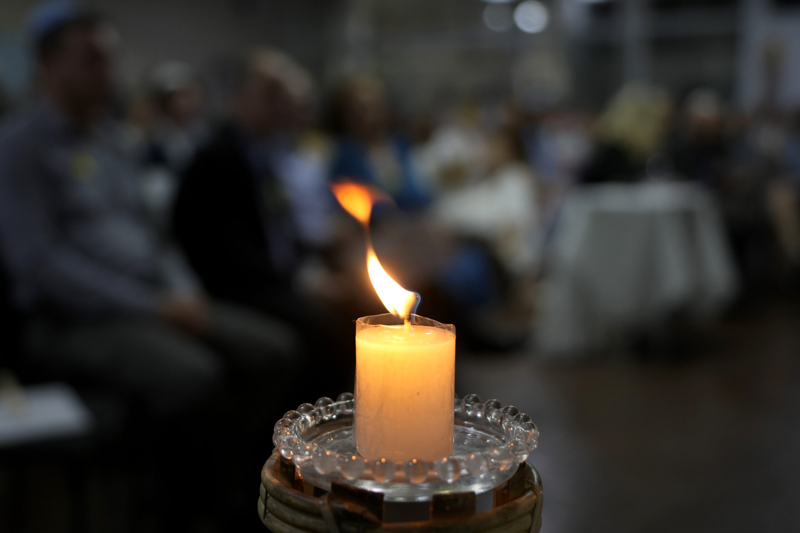 A candle burns for hostages kidnapped by Hamas