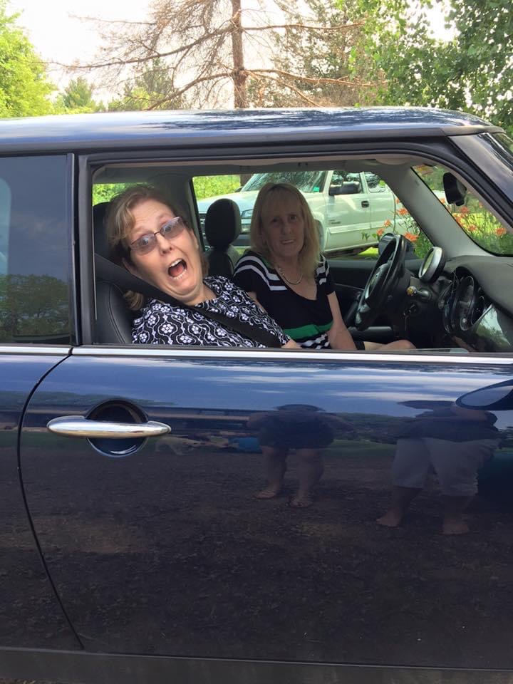 Sisters Mary Beth Nolan and Pam Gustafson in a car