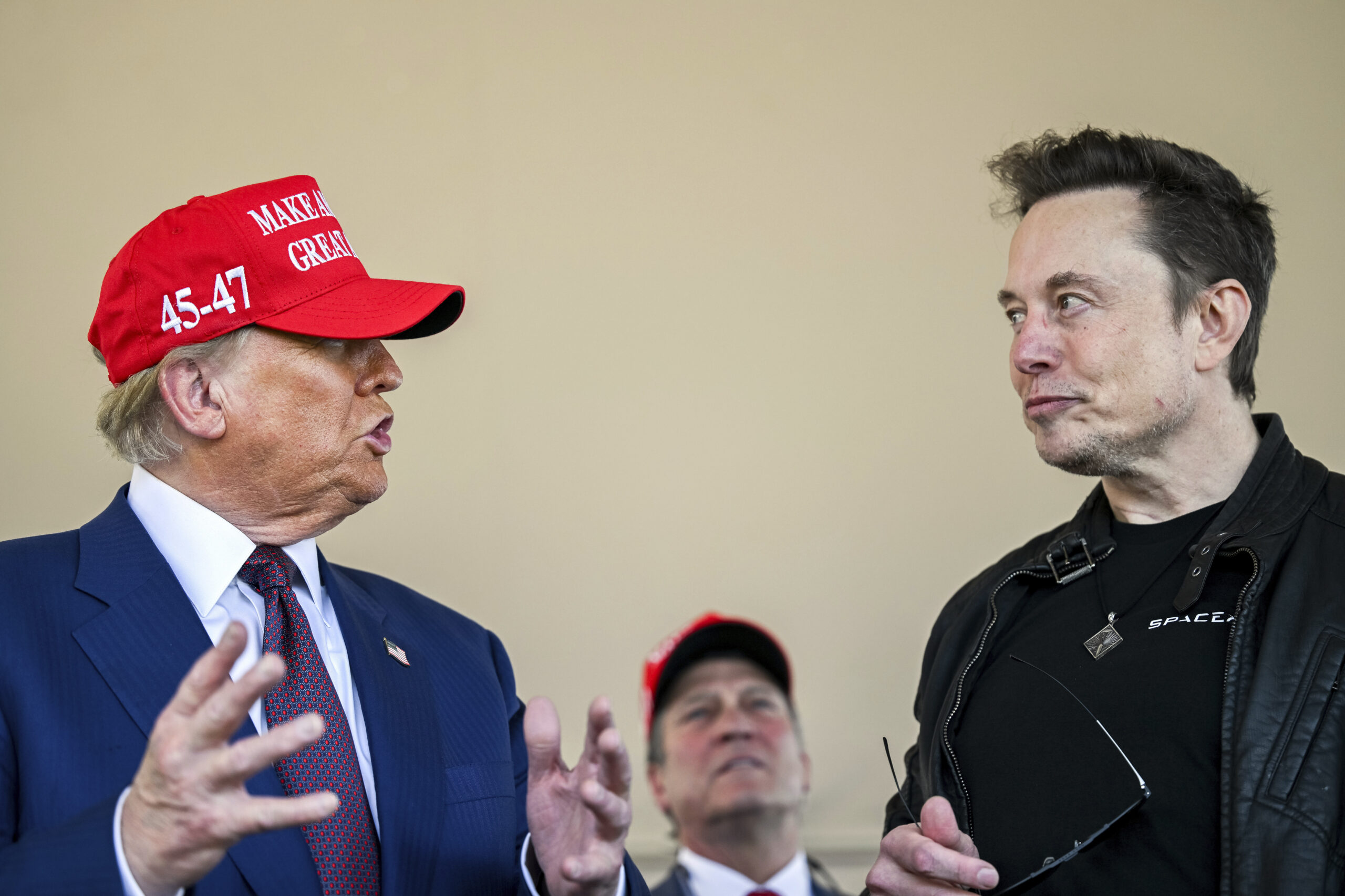 President-elect Donald Trump talks with Elon Musk as he arrives to watch SpaceX's mega rocket Starship lift off for a test flight from Starbase in Boca Chica, Texas, Tuesday, Nov. 19, 2024.