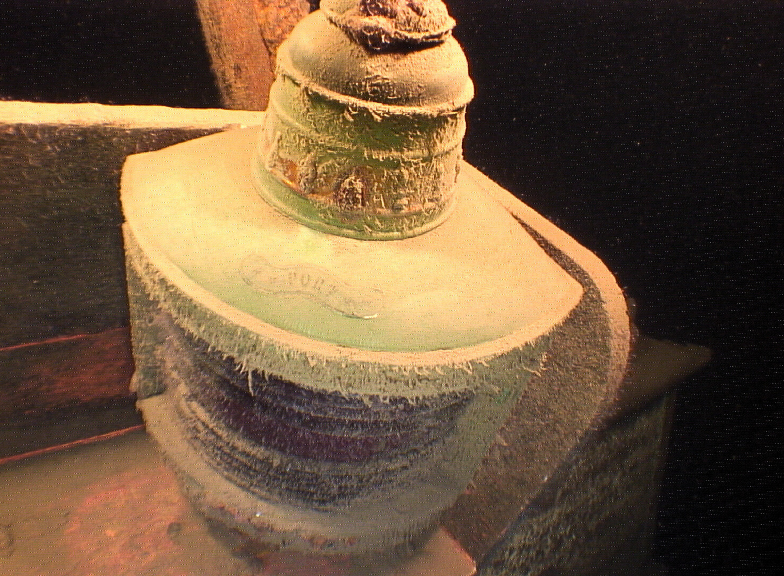 Dust-covered bronze telegraph from the Titanic shipwreck.